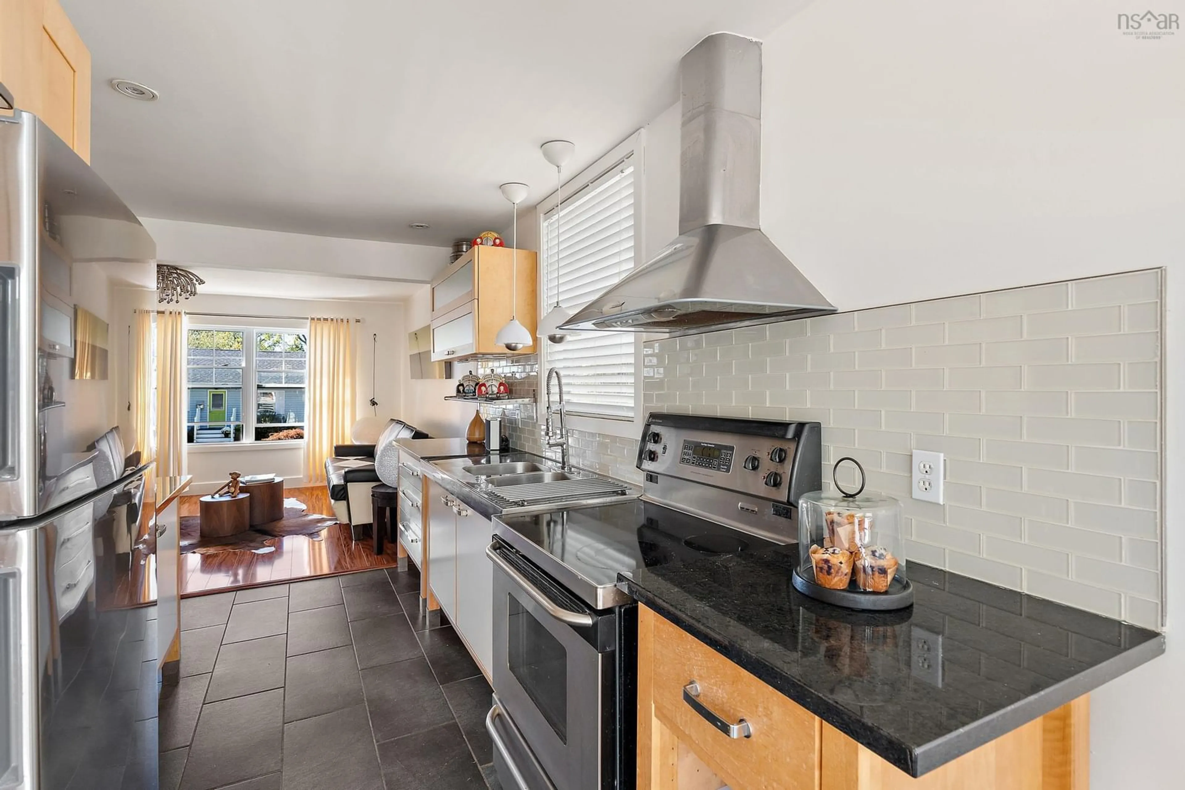 Open concept kitchen, ceramic/tile floor for 3207 Glendale Rd, West End Nova Scotia B3L 3S4