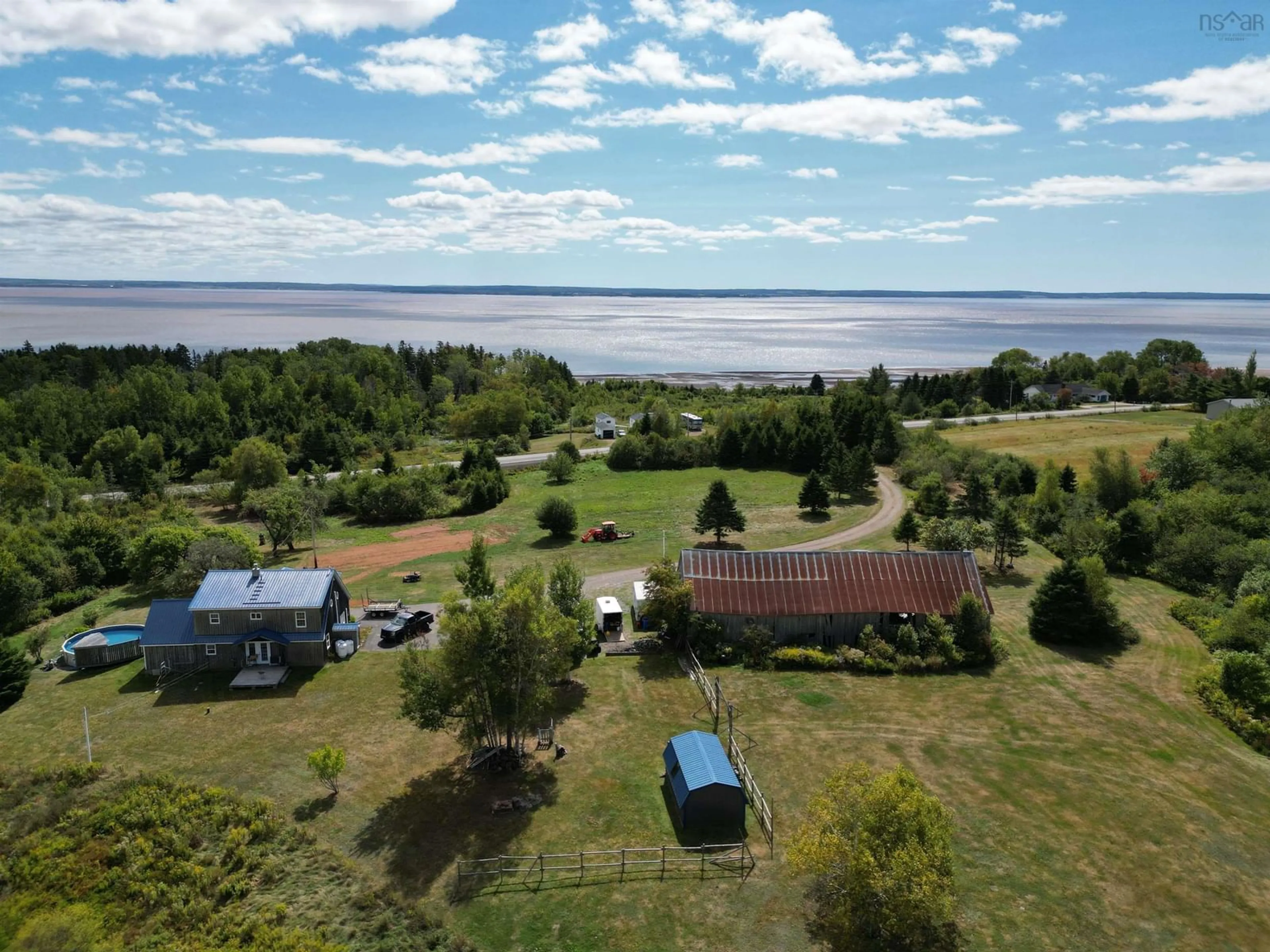 A pic from outside/outdoor area/front of a property/back of a property/a pic from drone, water/lake/river/ocean view for 4857 Highway 2, Little Bass River Nova Scotia B0M 1B0