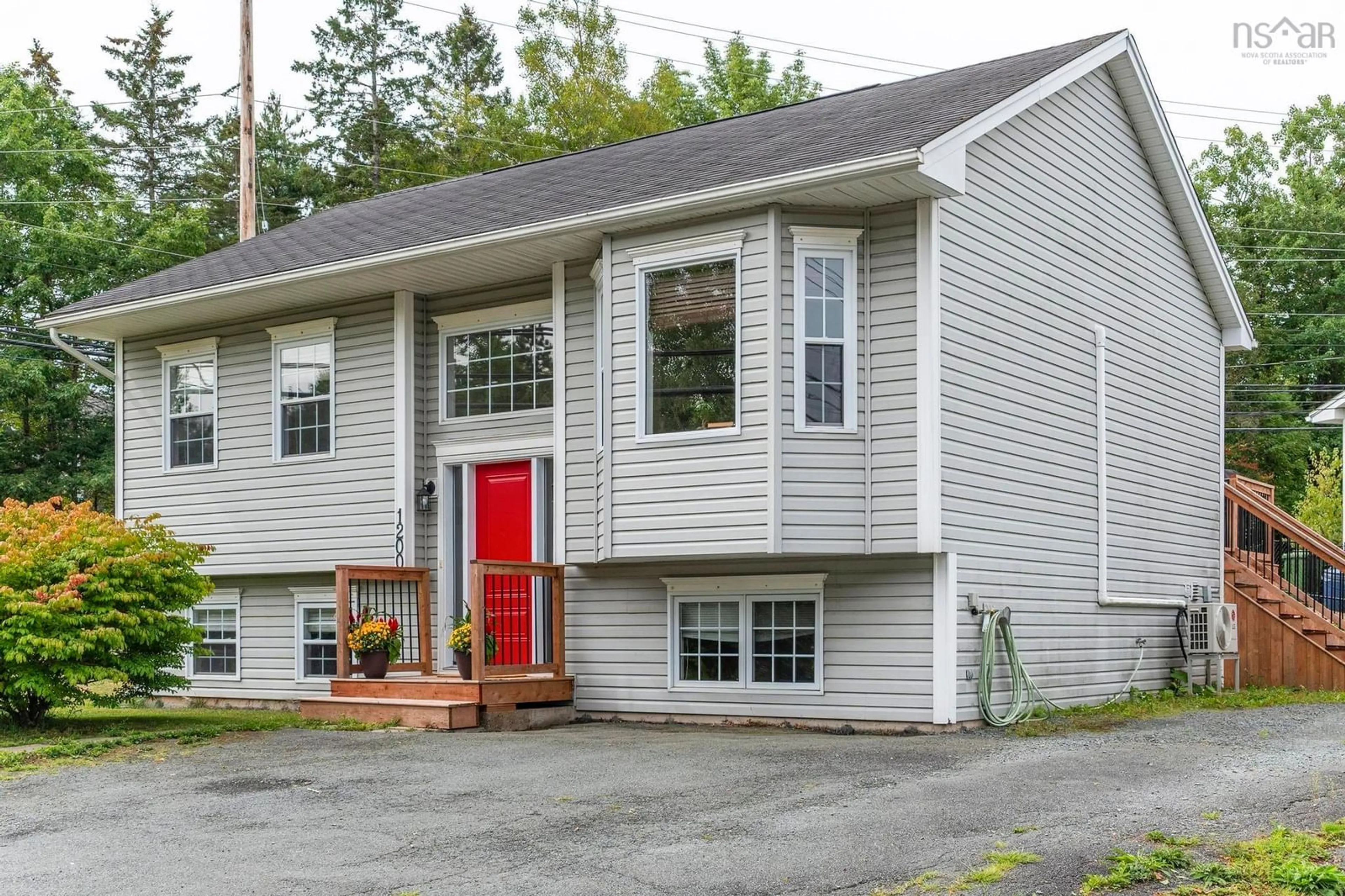 Home with vinyl exterior material, street for 1200 Sackville Dr, Middle Sackville Nova Scotia B4E 3G1