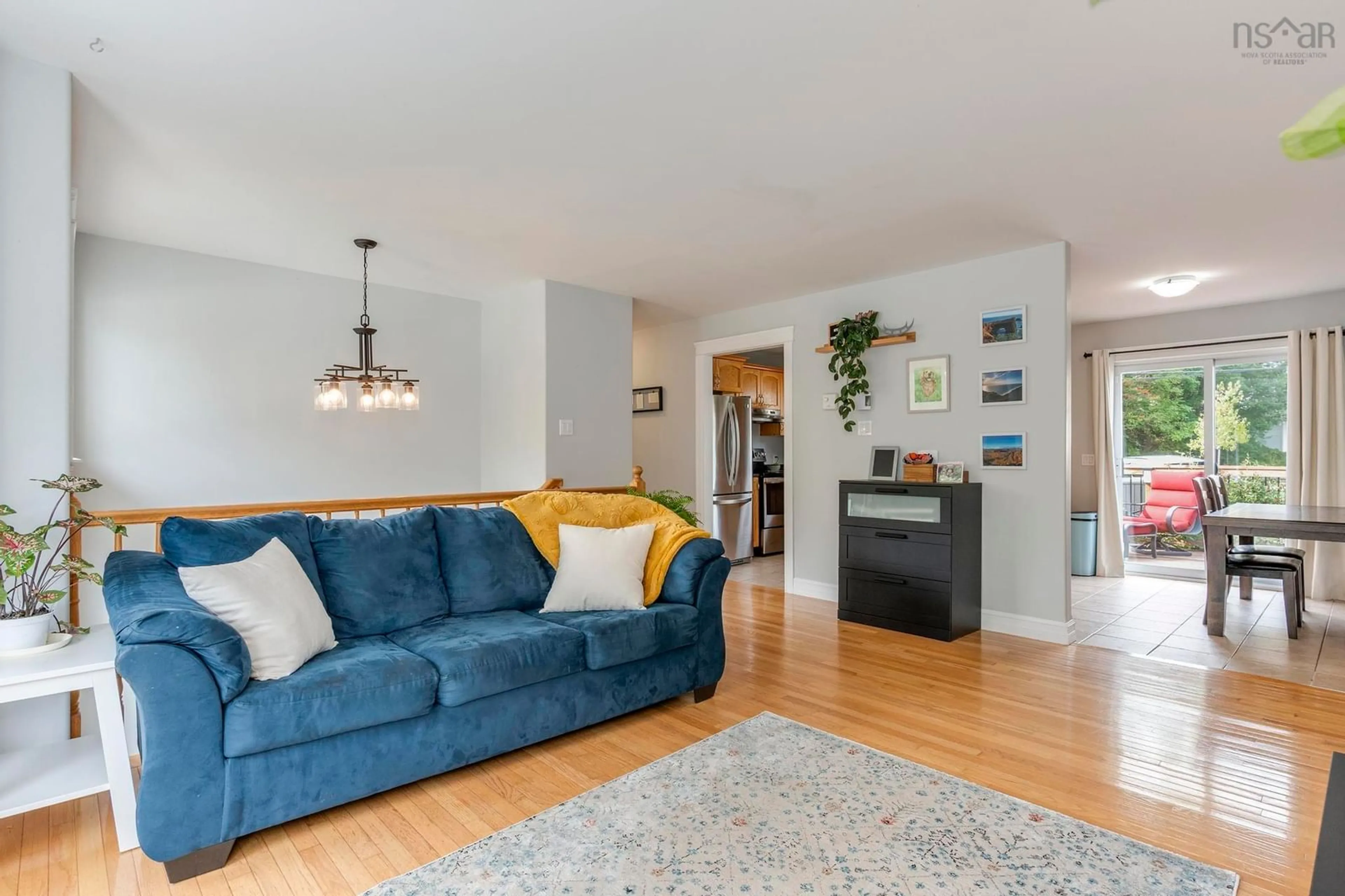 Living room with furniture, wood/laminate floor for 1200 Sackville Dr, Middle Sackville Nova Scotia B4E 3G1