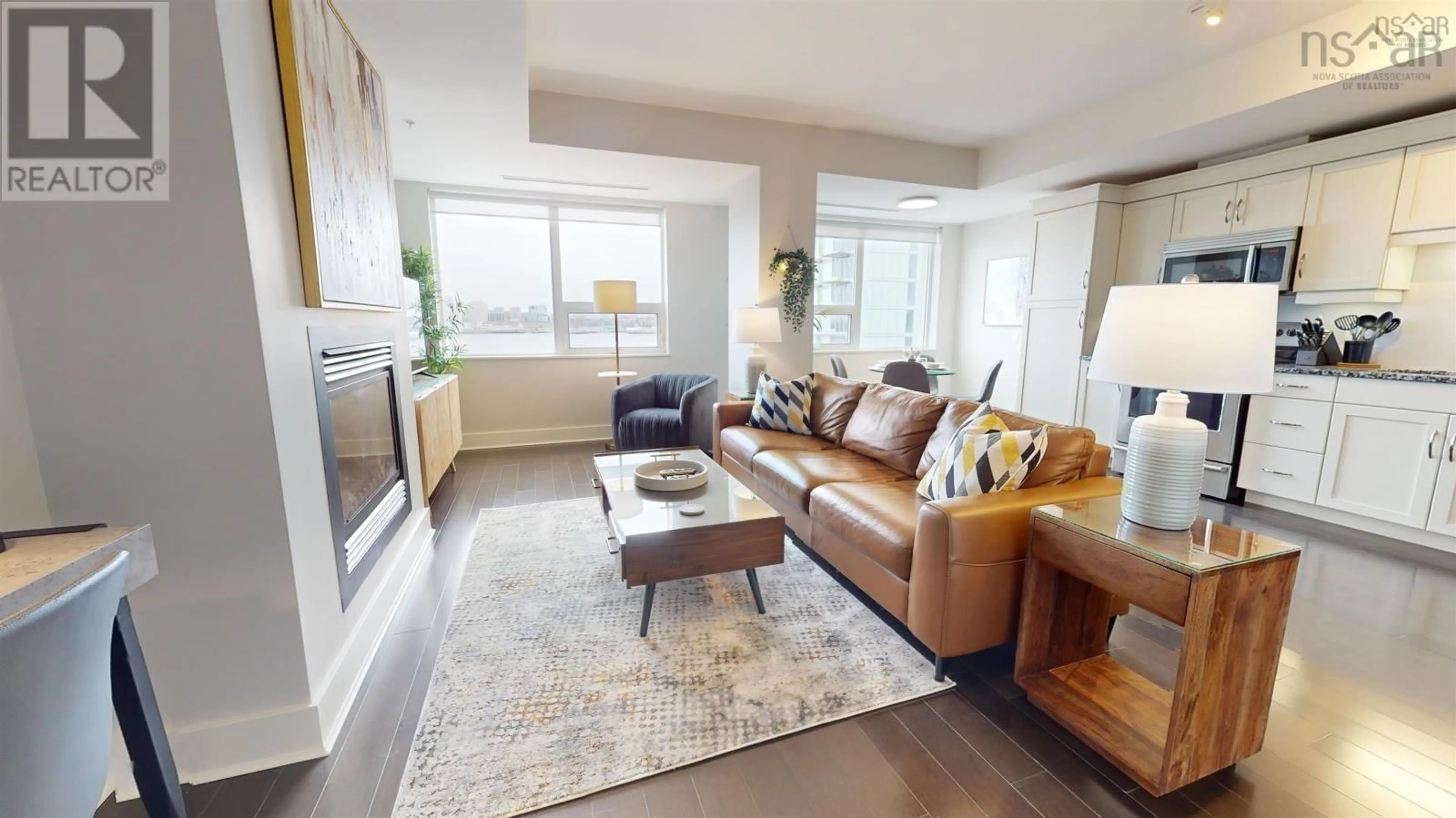 Living room with furniture, wood/laminate floor for 605 31 Kings Wharf Place, Dartmouth Nova Scotia B2Y 0C1