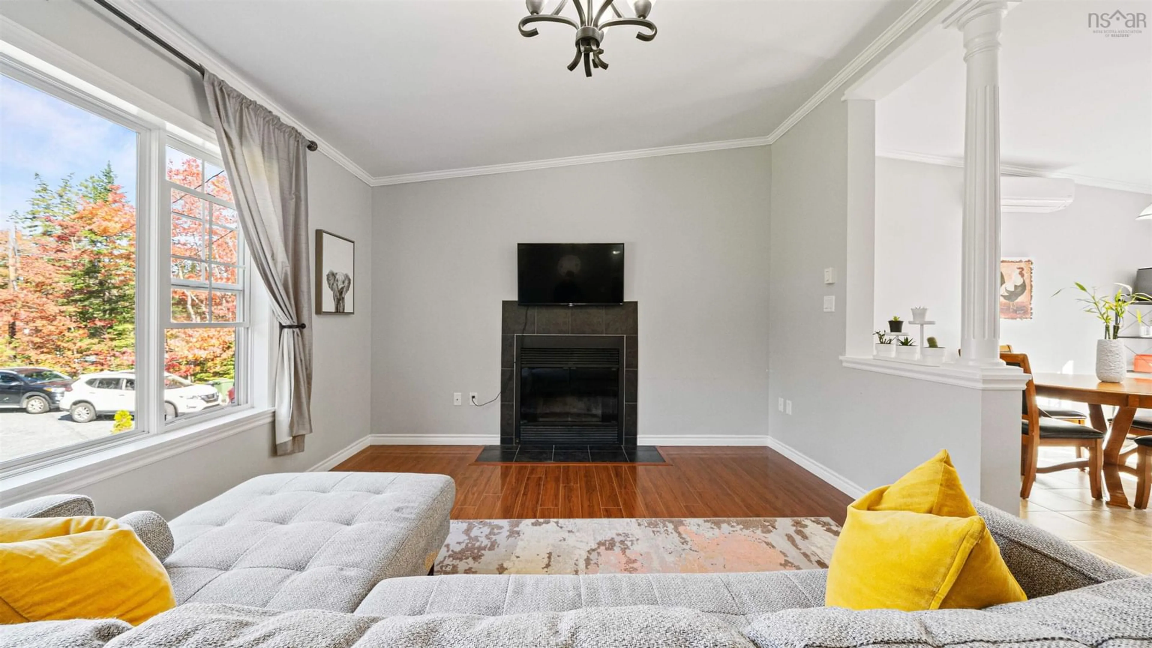 Living room with furniture, wood/laminate floor for 2407 Old Guysborough Roads, Goffs Nova Scotia B2T 1B9