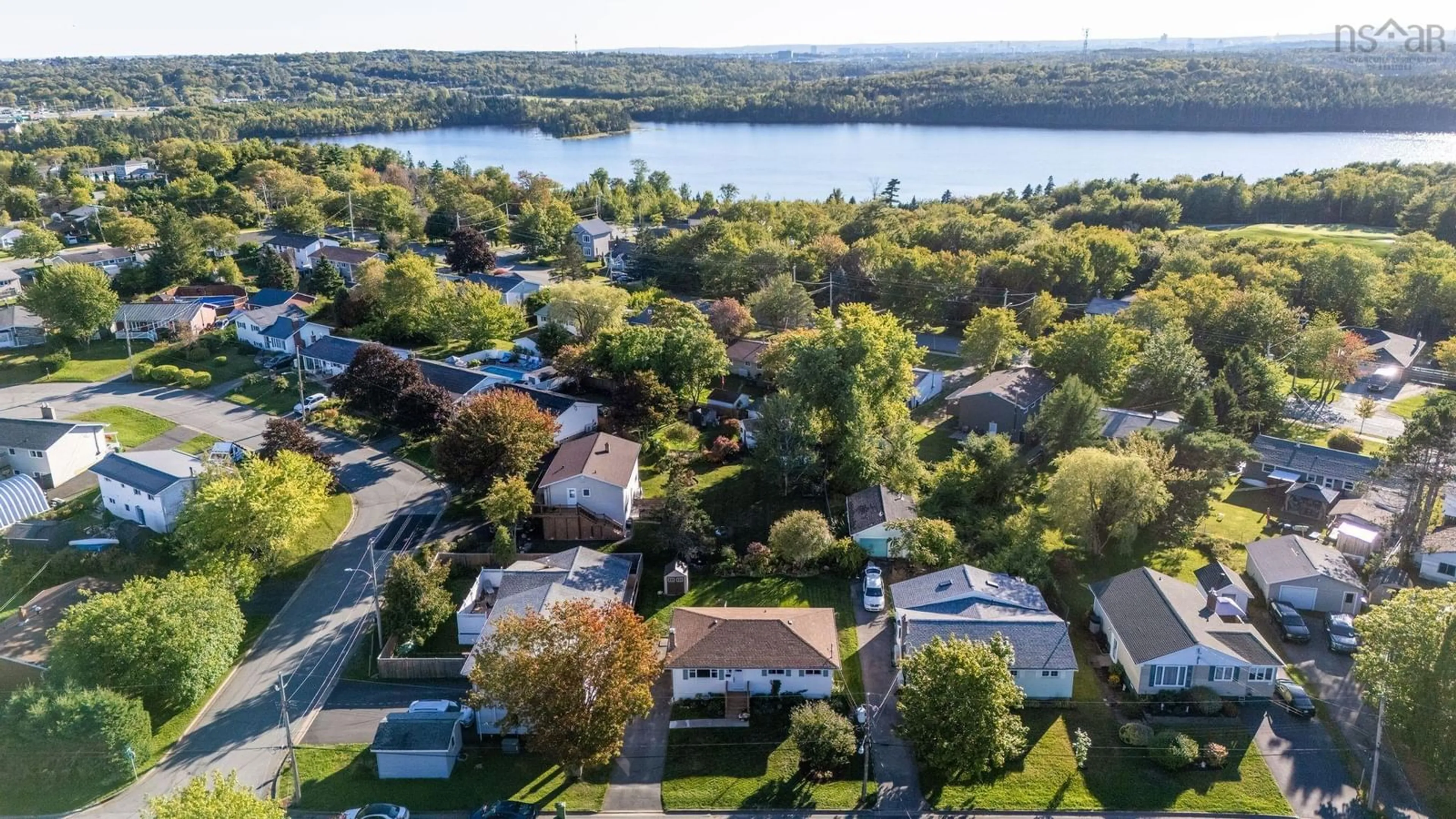 A pic from outside/outdoor area/front of a property/back of a property/a pic from drone, water/lake/river/ocean view for 44 Codroy Ave, Lake Loon Nova Scotia B2W 3R4