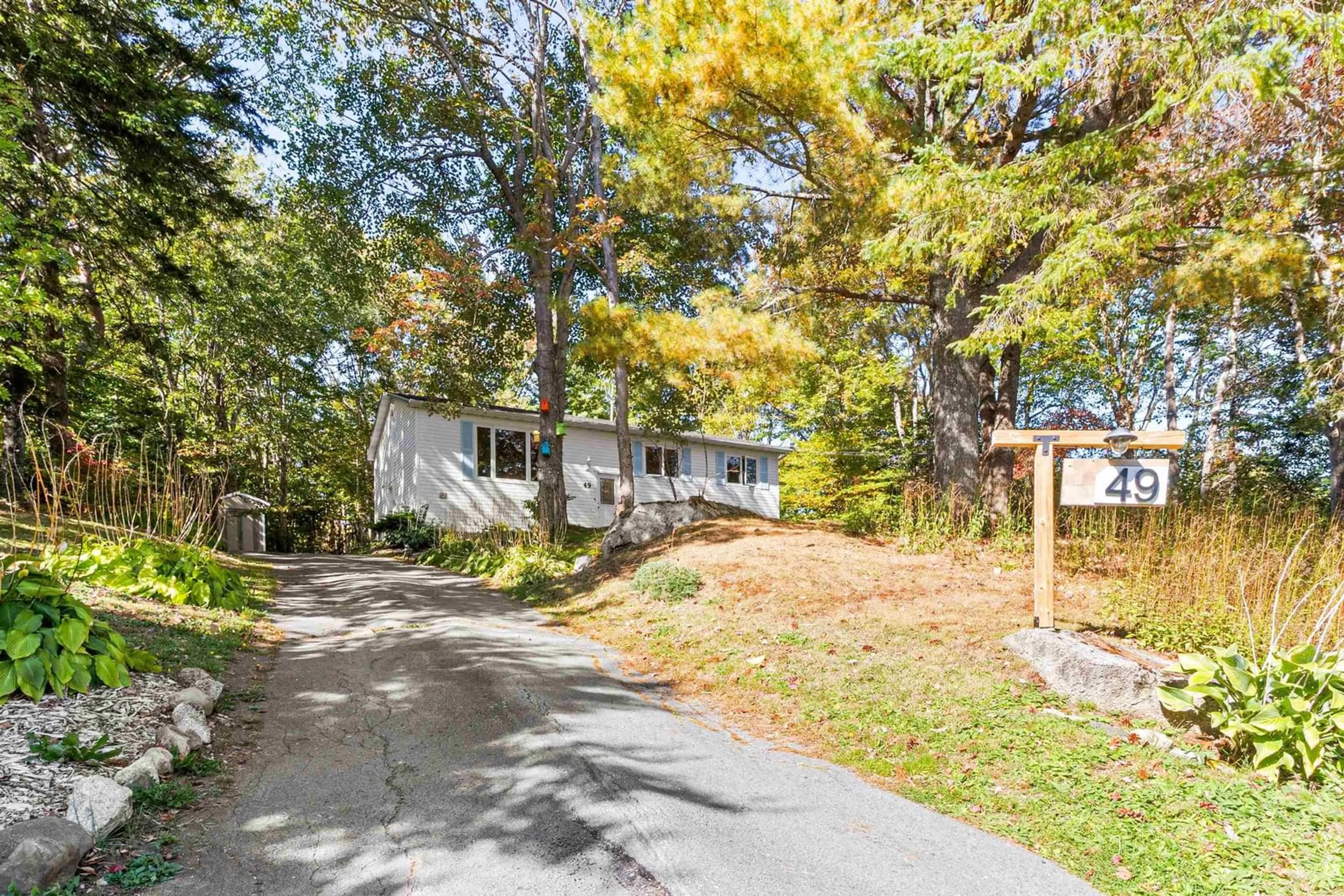 A pic from outside/outdoor area/front of a property/back of a property/a pic from drone, street for 49 Pinetree Cres, Hammonds Plains Nova Scotia B3Z 1K4