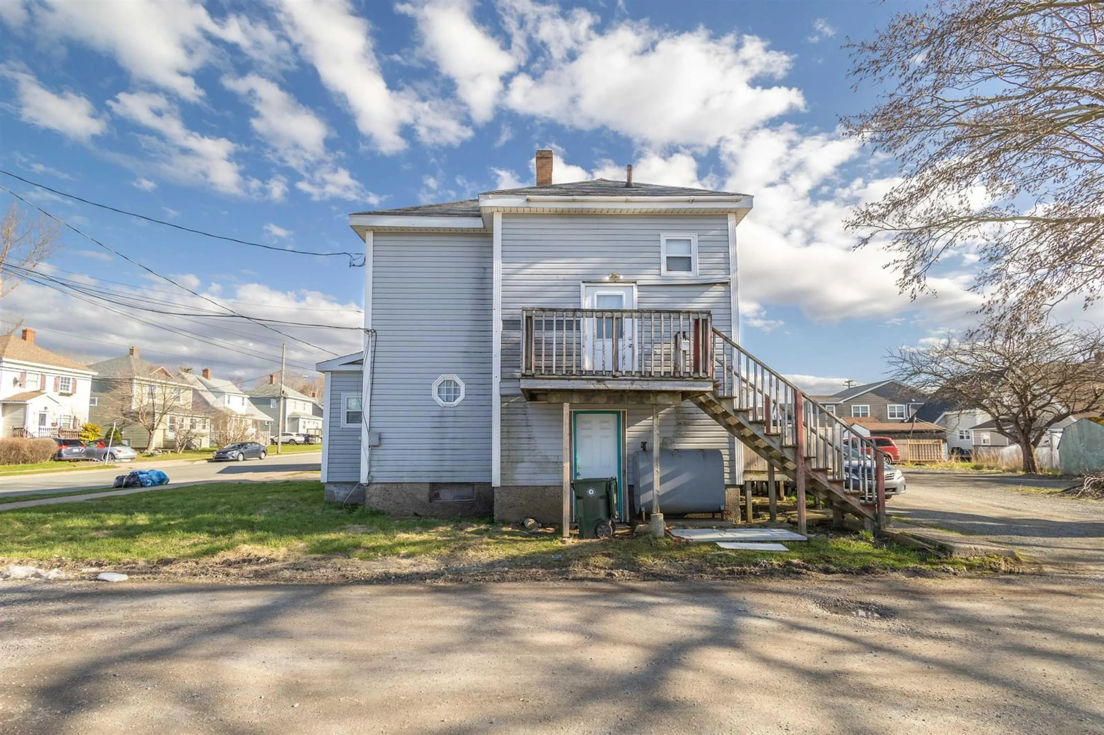 A pic from outside/outdoor area/front of a property/back of a property/a pic from drone, street for 455 Whitney Ave, Sydney Nova Scotia B1L 1G2