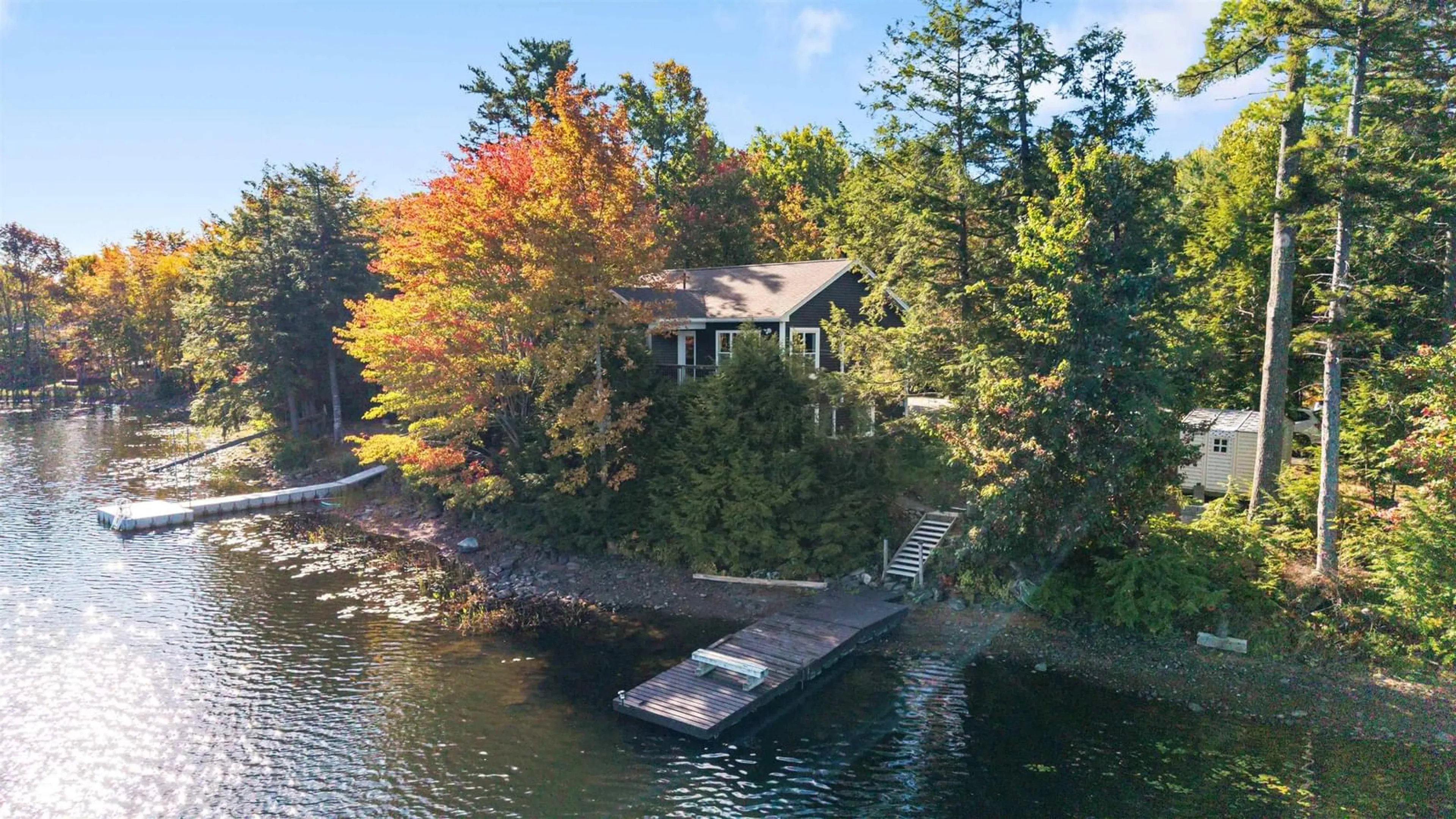 A pic from outside/outdoor area/front of a property/back of a property/a pic from drone, water/lake/river/ocean view for 40 Tucker Lake Rd, Beaver Bank Nova Scotia B4G 1C3