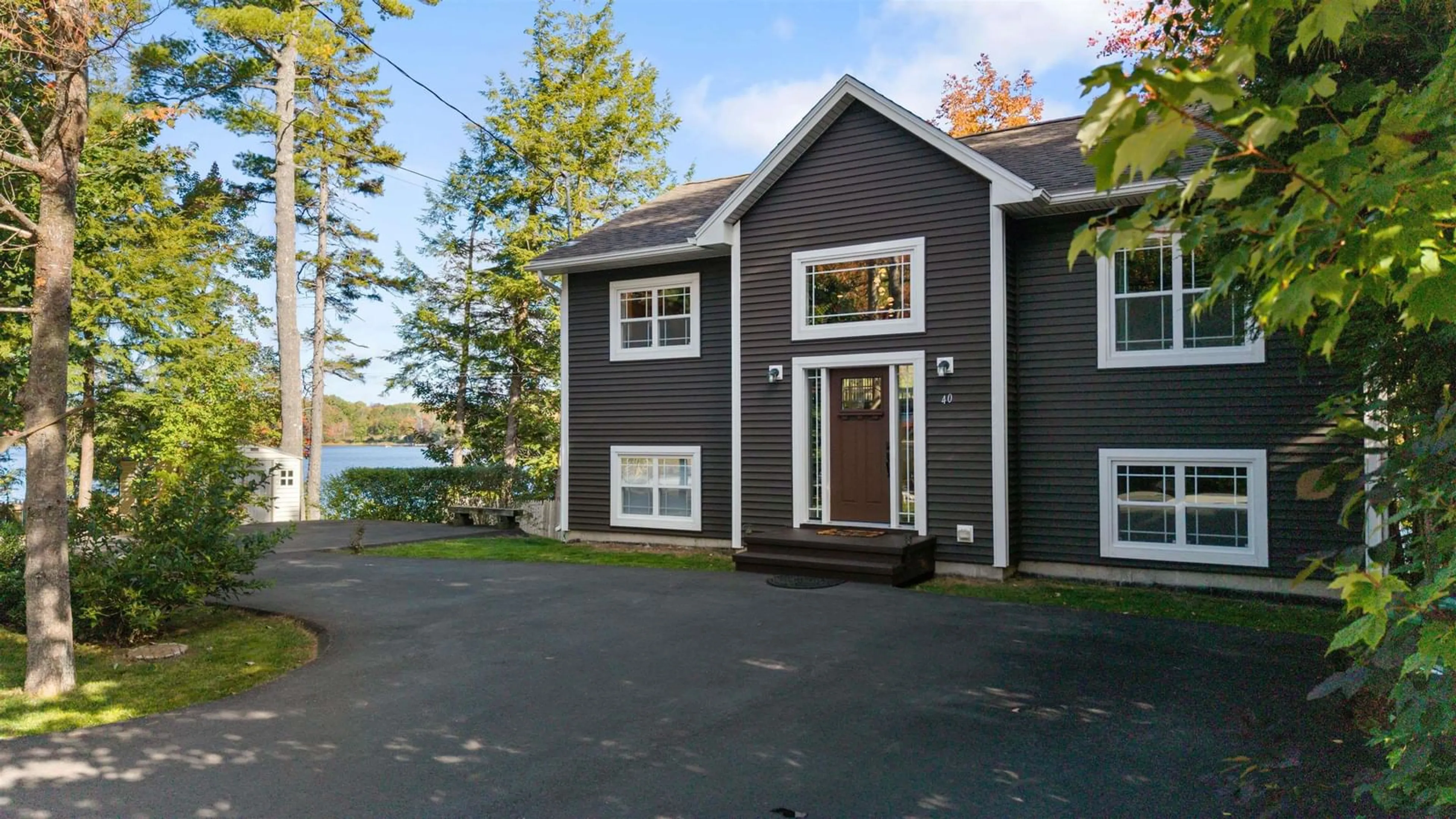 Home with vinyl exterior material, street for 40 Tucker Lake Rd, Beaver Bank Nova Scotia B4G 1C3