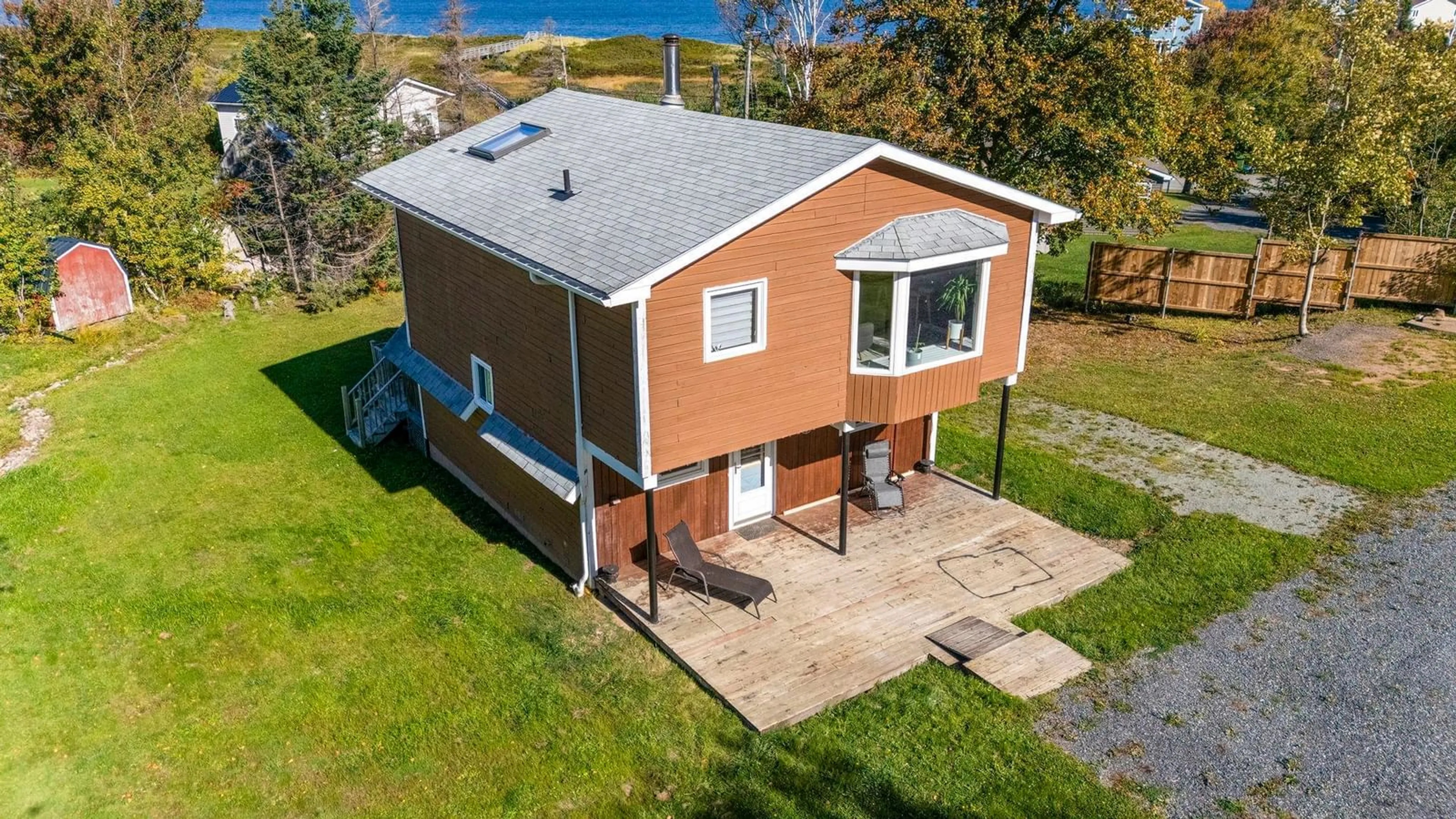 A pic from outside/outdoor area/front of a property/back of a property/a pic from drone, building for 6157 Little Harbour Rd, Kings Head Nova Scotia B2H 5C4