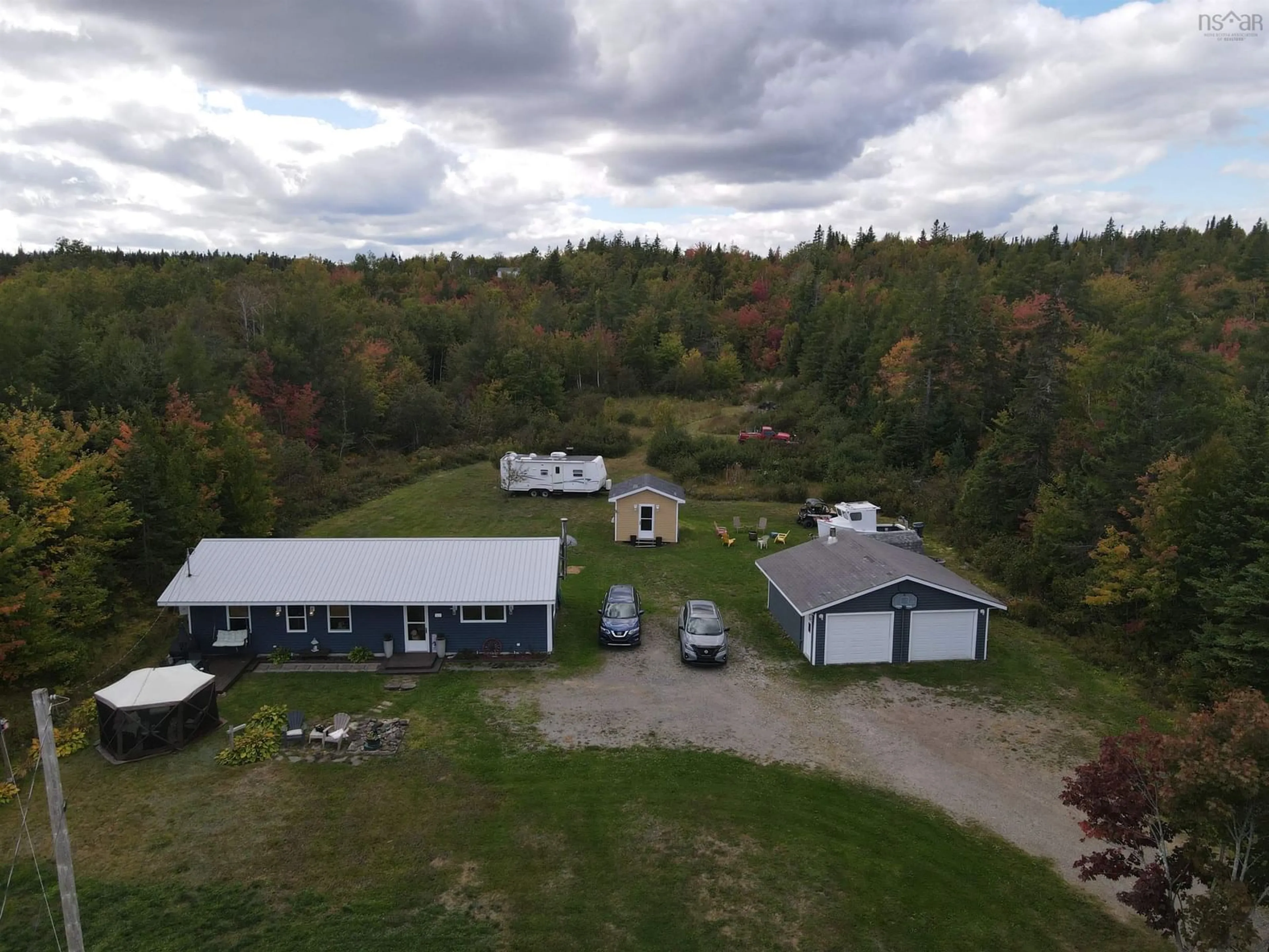 A pic from outside/outdoor area/front of a property/back of a property/a pic from drone, unknown for 5231 Grand Mira North Rd, Grand Mira North Nova Scotia B1K 1P9