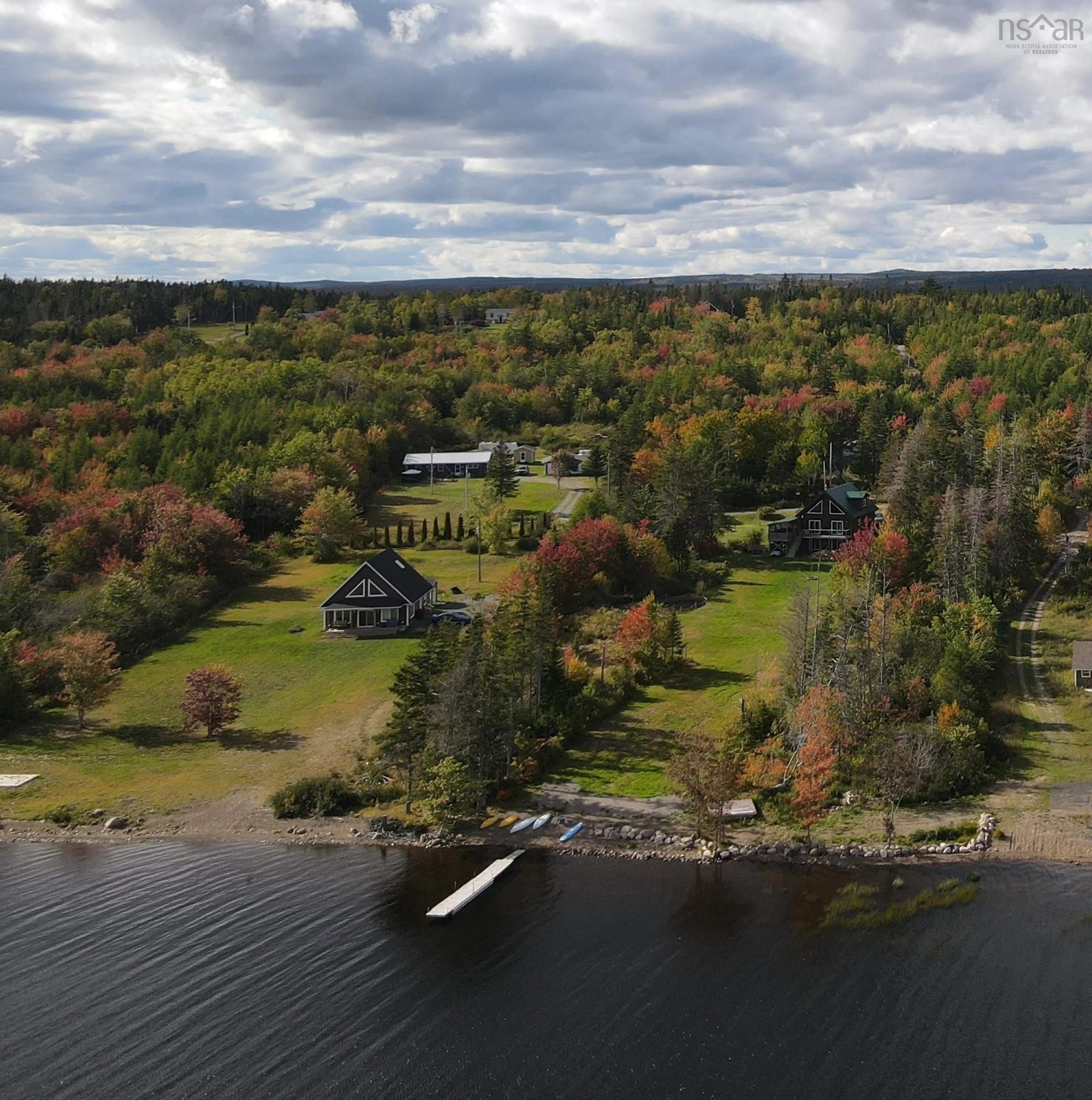 A pic from outside/outdoor area/front of a property/back of a property/a pic from drone, water/lake/river/ocean view for 5231 Grand Mira North Rd, Grand Mira North Nova Scotia B1K 1P9