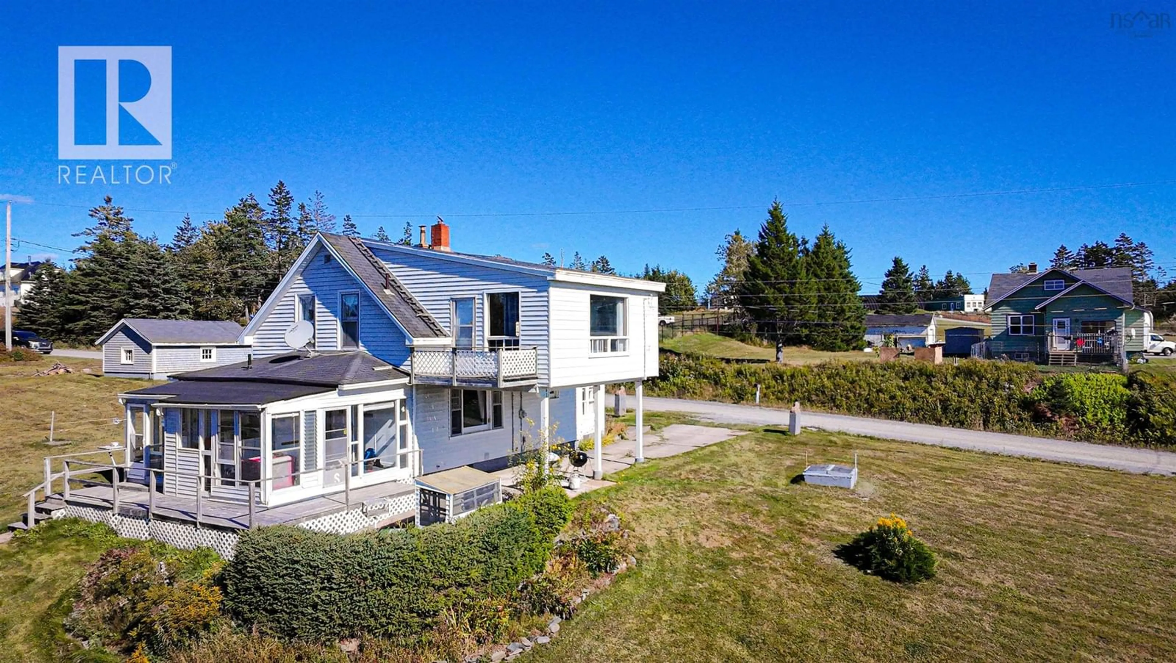 A pic from outside/outdoor area/front of a property/back of a property/a pic from drone, water/lake/river/ocean view for 11 Harbourview Dr, Watt Section Nova Scotia B0J 3B0