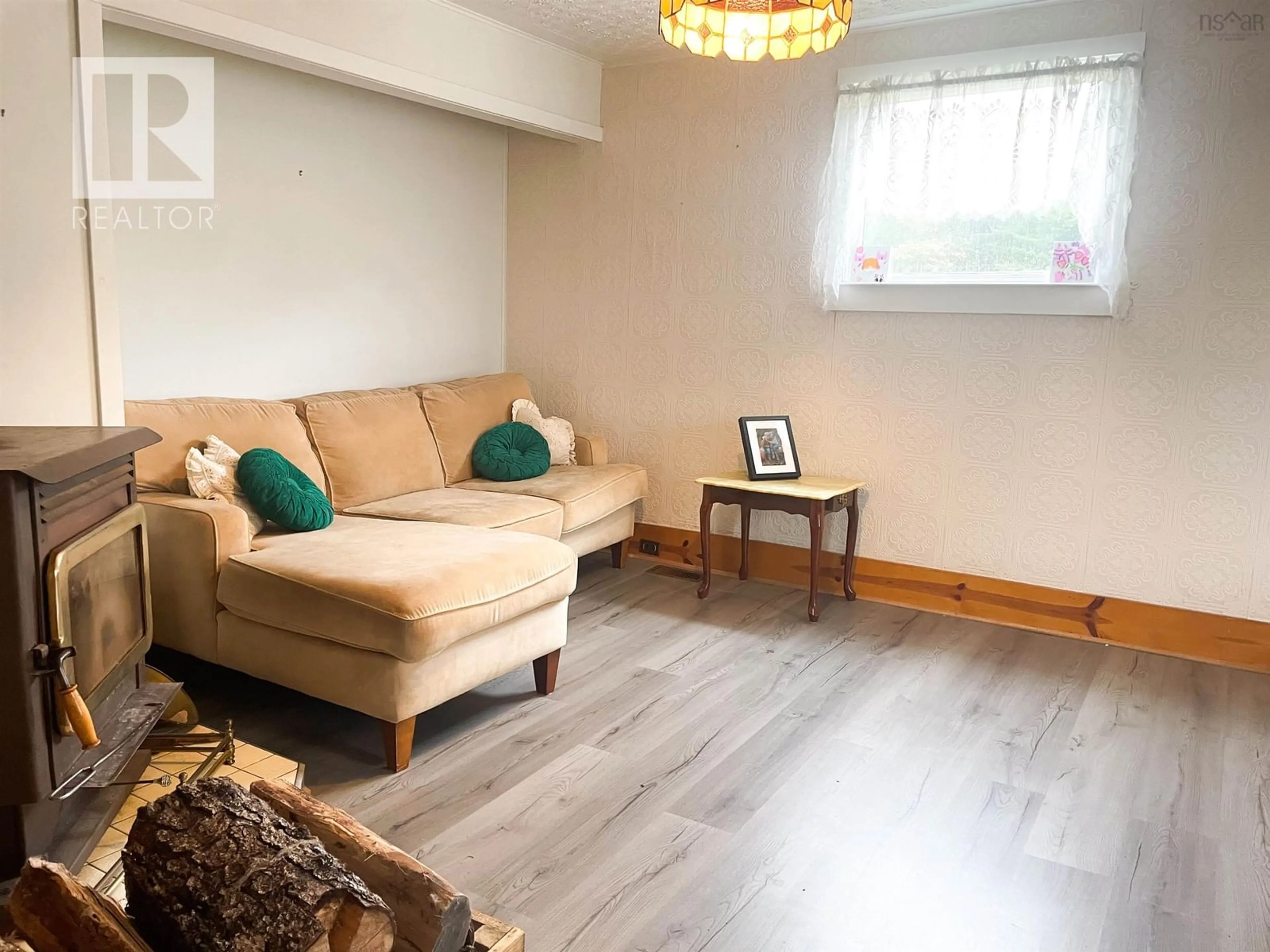 Living room with furniture, wood/laminate floor for 11 Harbourview Dr, Watt Section Nova Scotia B0J 3B0
