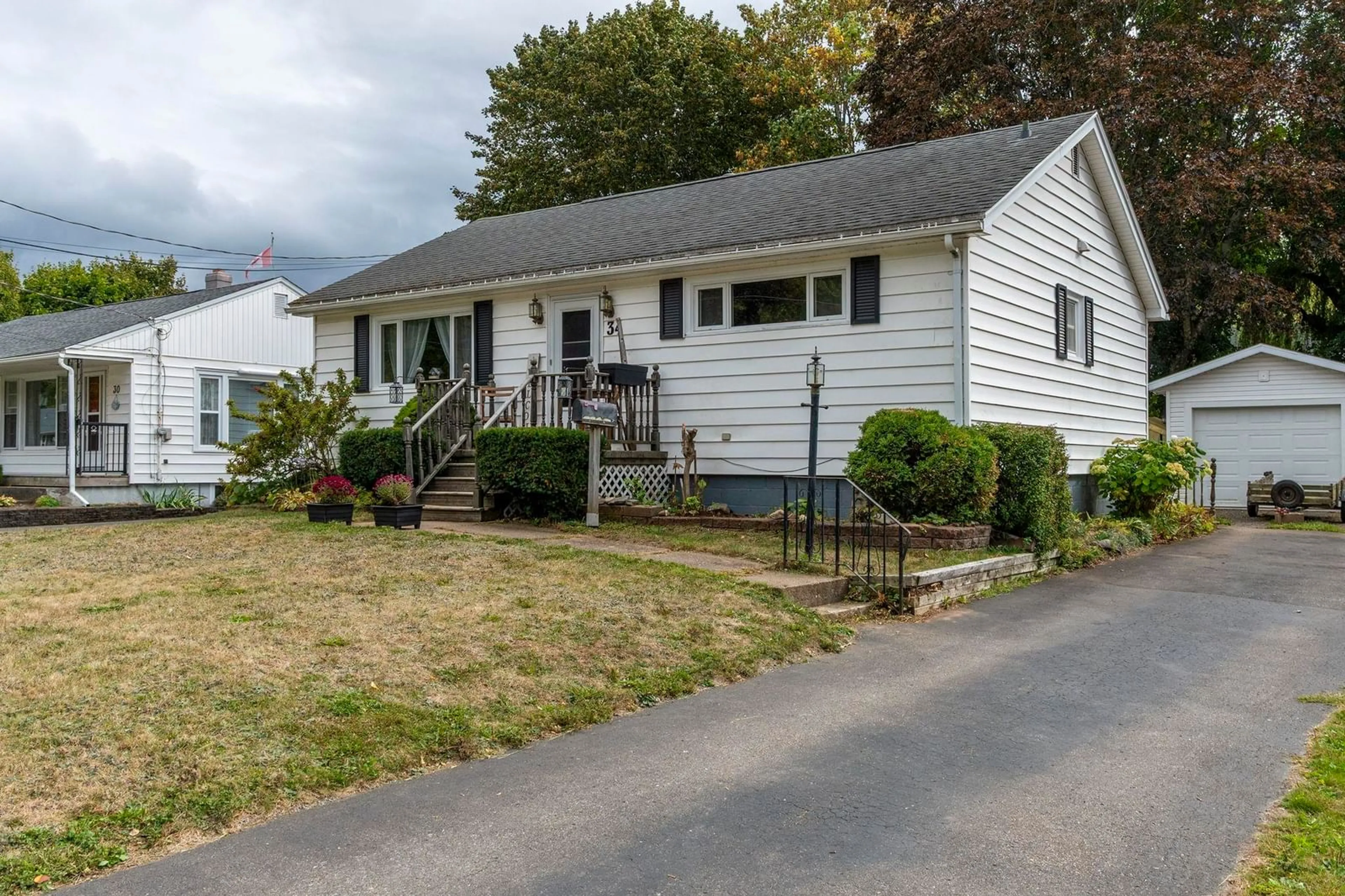 Home with vinyl exterior material, street for 34 Wade St, Kentville Nova Scotia B4N 1B6
