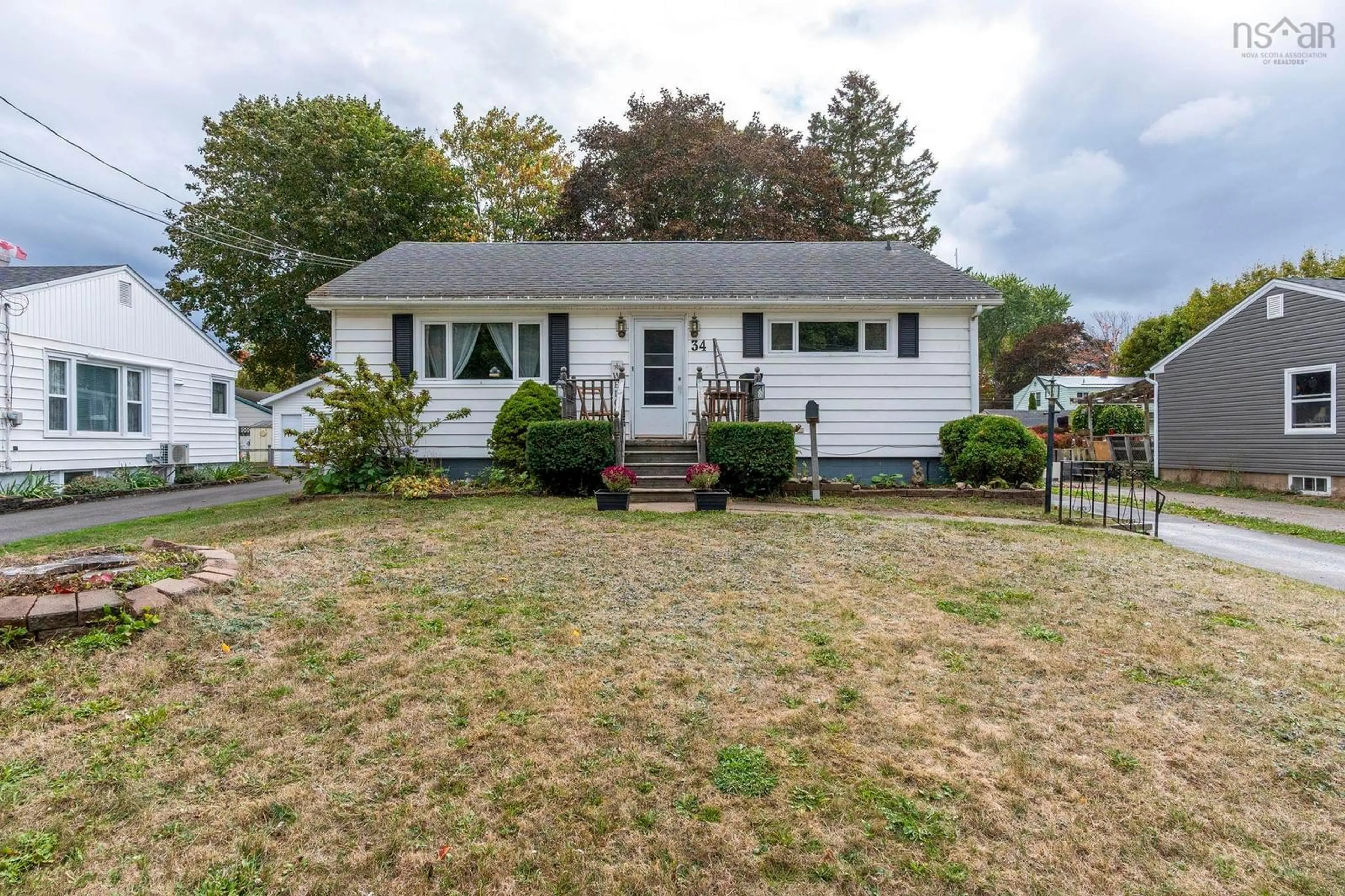 Home with vinyl exterior material, street for 34 Wade St, Kentville Nova Scotia B4N 1B6