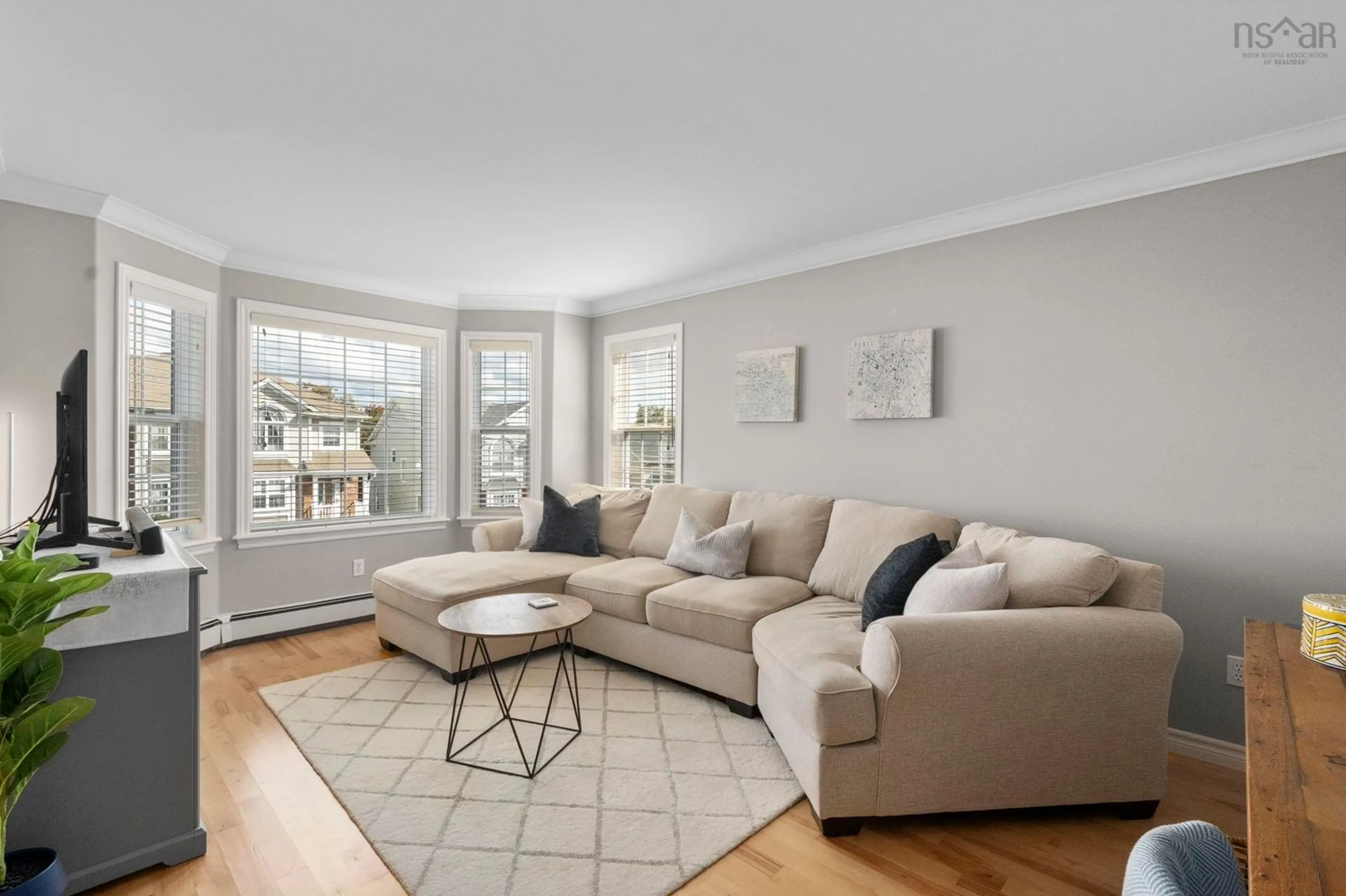 Living room with furniture, wood/laminate floor for 56 Fleetview Dr, Halifax Nova Scotia B3M 4W2