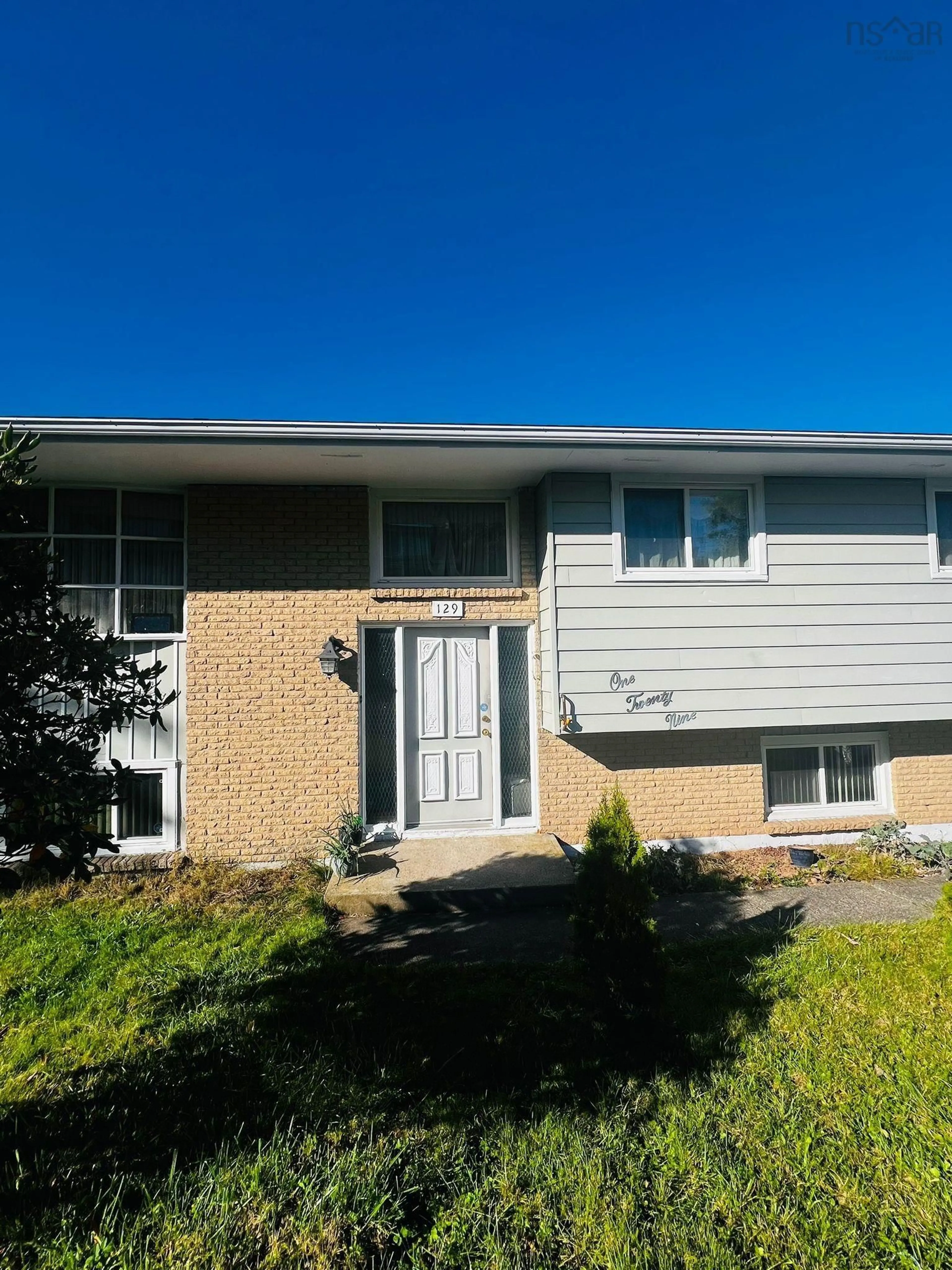 Home with vinyl exterior material, street for 129 Regal Rd, Dartmouth Nova Scotia B2W 4H7