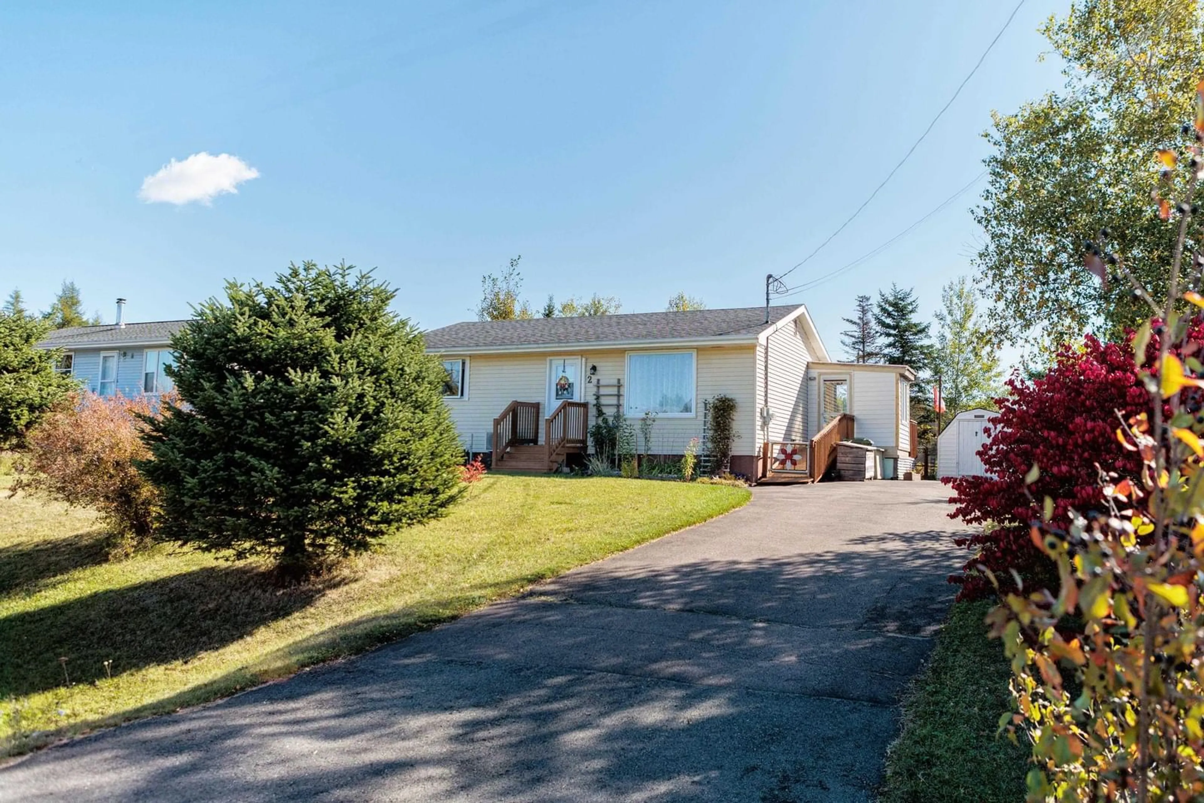 A pic from outside/outdoor area/front of a property/back of a property/a pic from drone, street for 2 Menlow Crt, North River Nova Scotia B6L 6L9