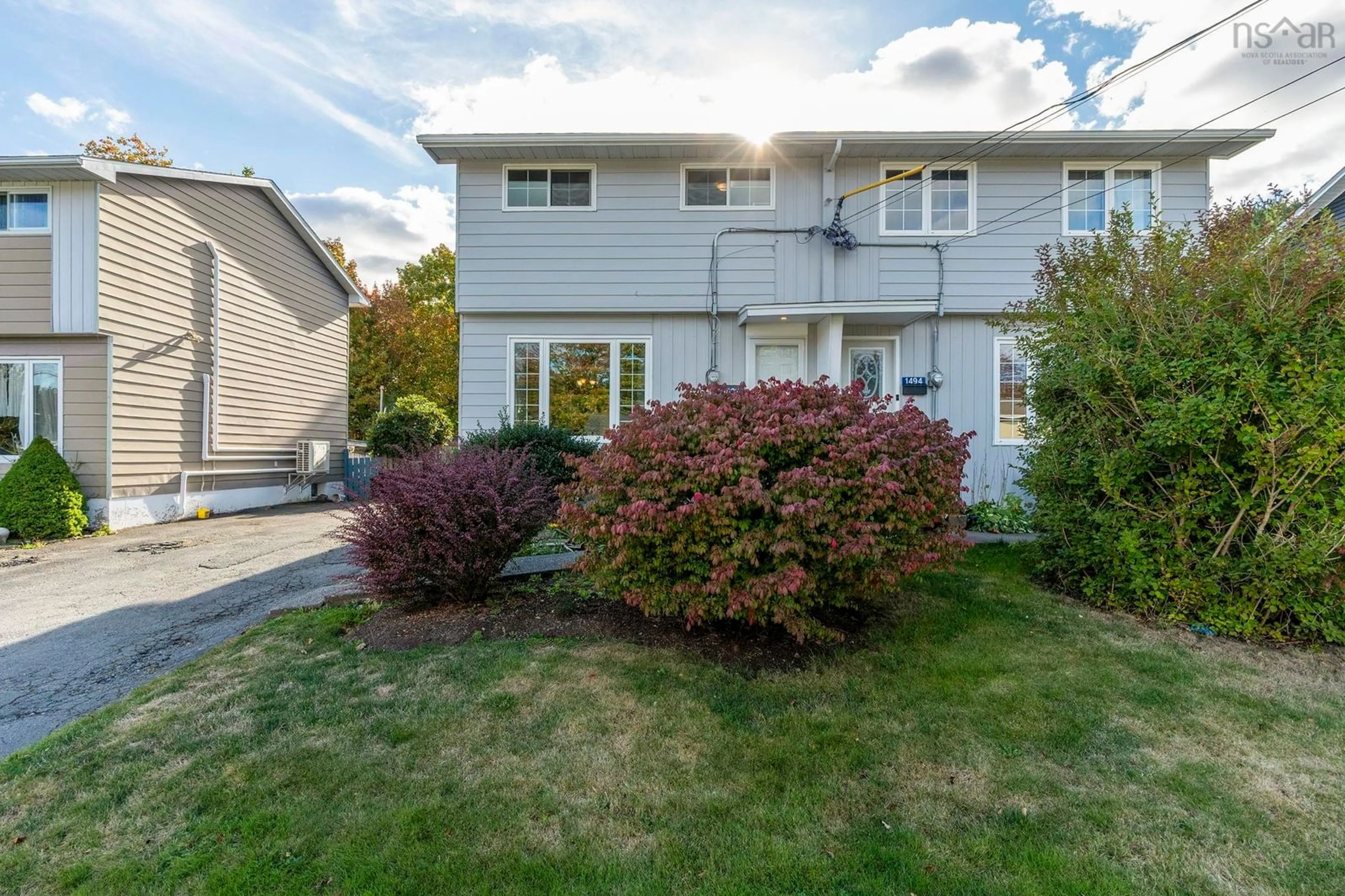 Home with vinyl exterior material, street for 1492 Riverside Dr, Lower Sackville Nova Scotia B4C 2Y8