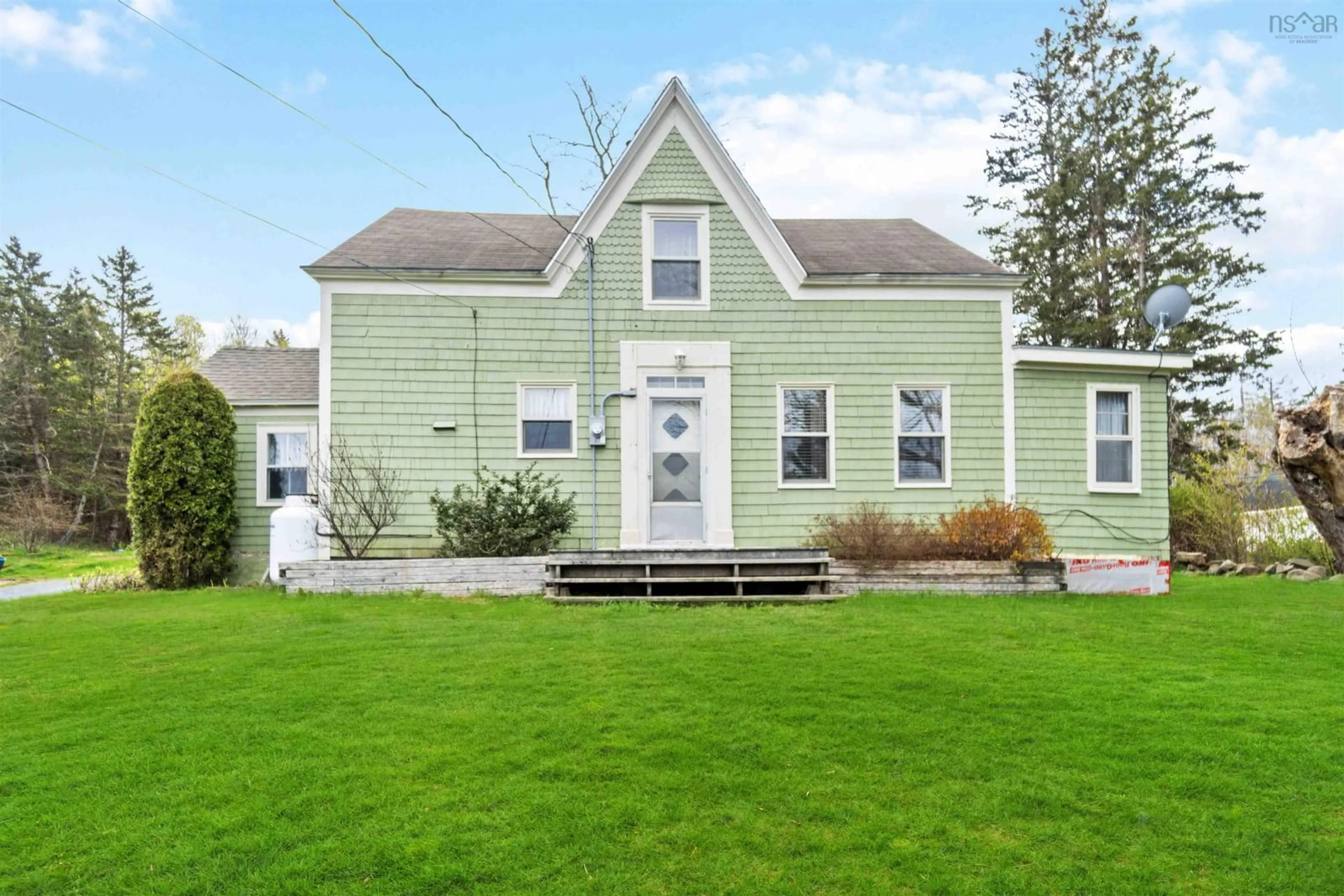Home with vinyl exterior material, street for 1256 Highway 1, Clementsport Nova Scotia B0S 1E0