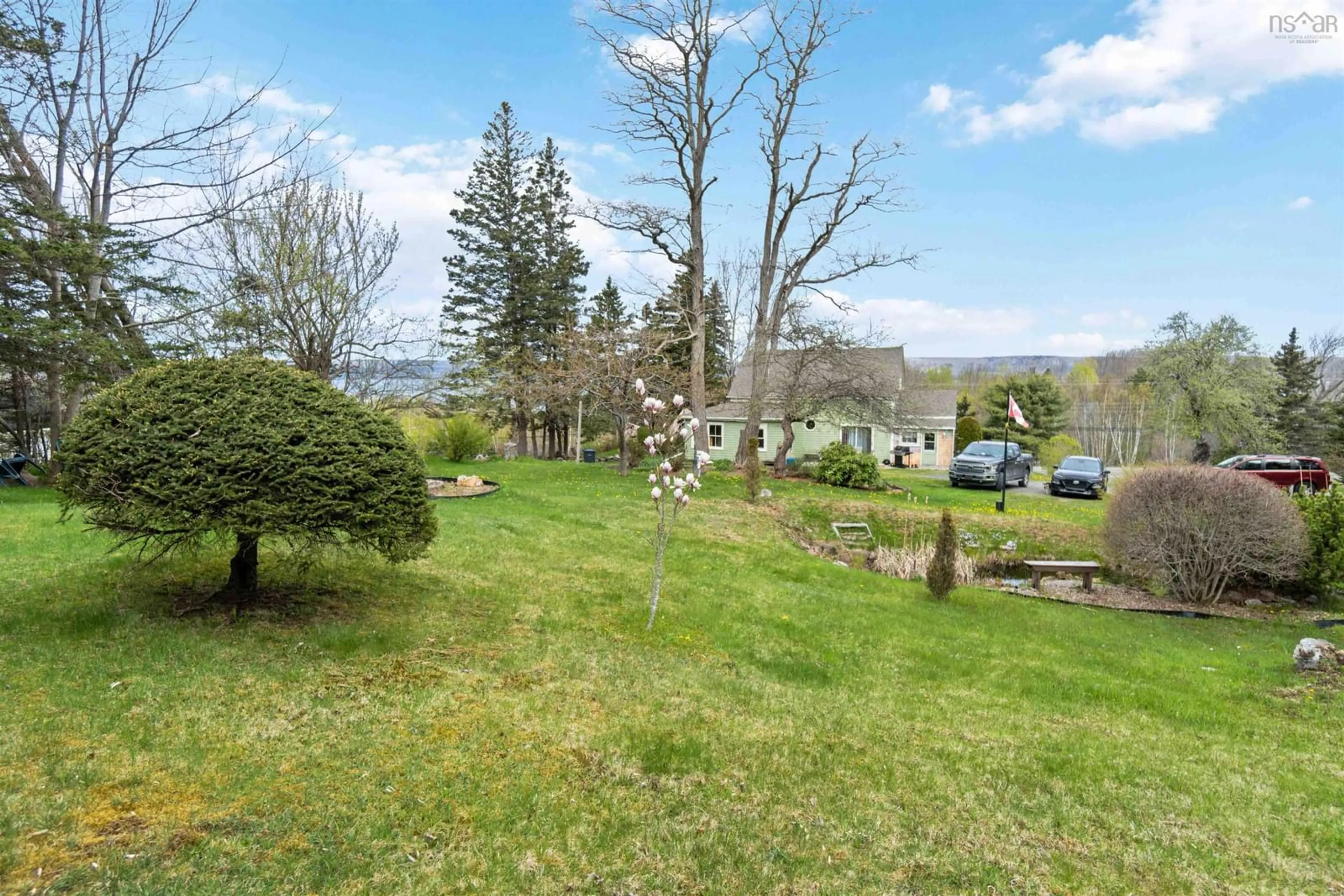 A pic from outside/outdoor area/front of a property/back of a property/a pic from drone, forest/trees view for 1256 Highway 1, Clementsport Nova Scotia B0S 1E0