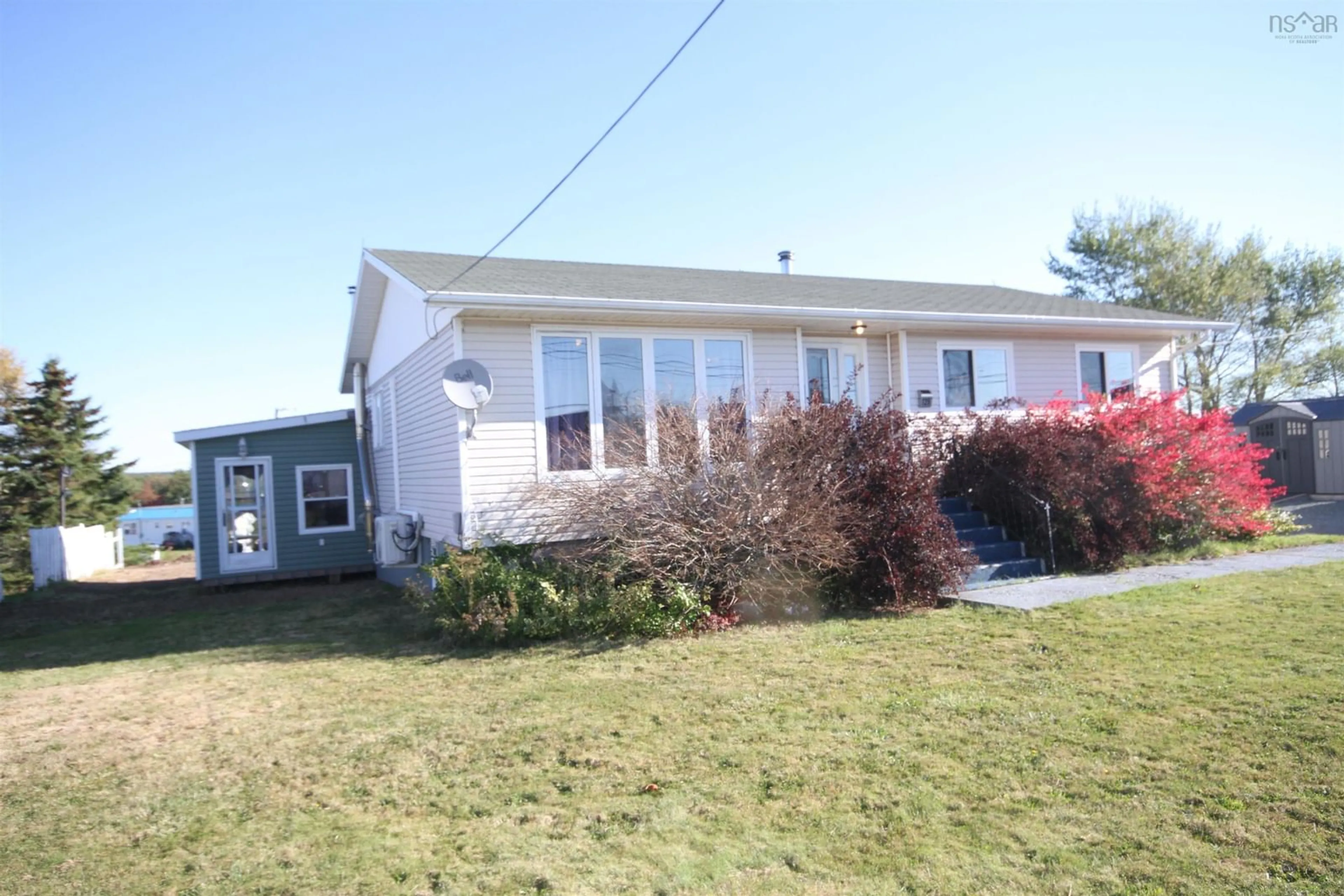 Home with vinyl exterior material, street for 125 Grandique Ferry Rd, Louisdale Nova Scotia B0E 1V0