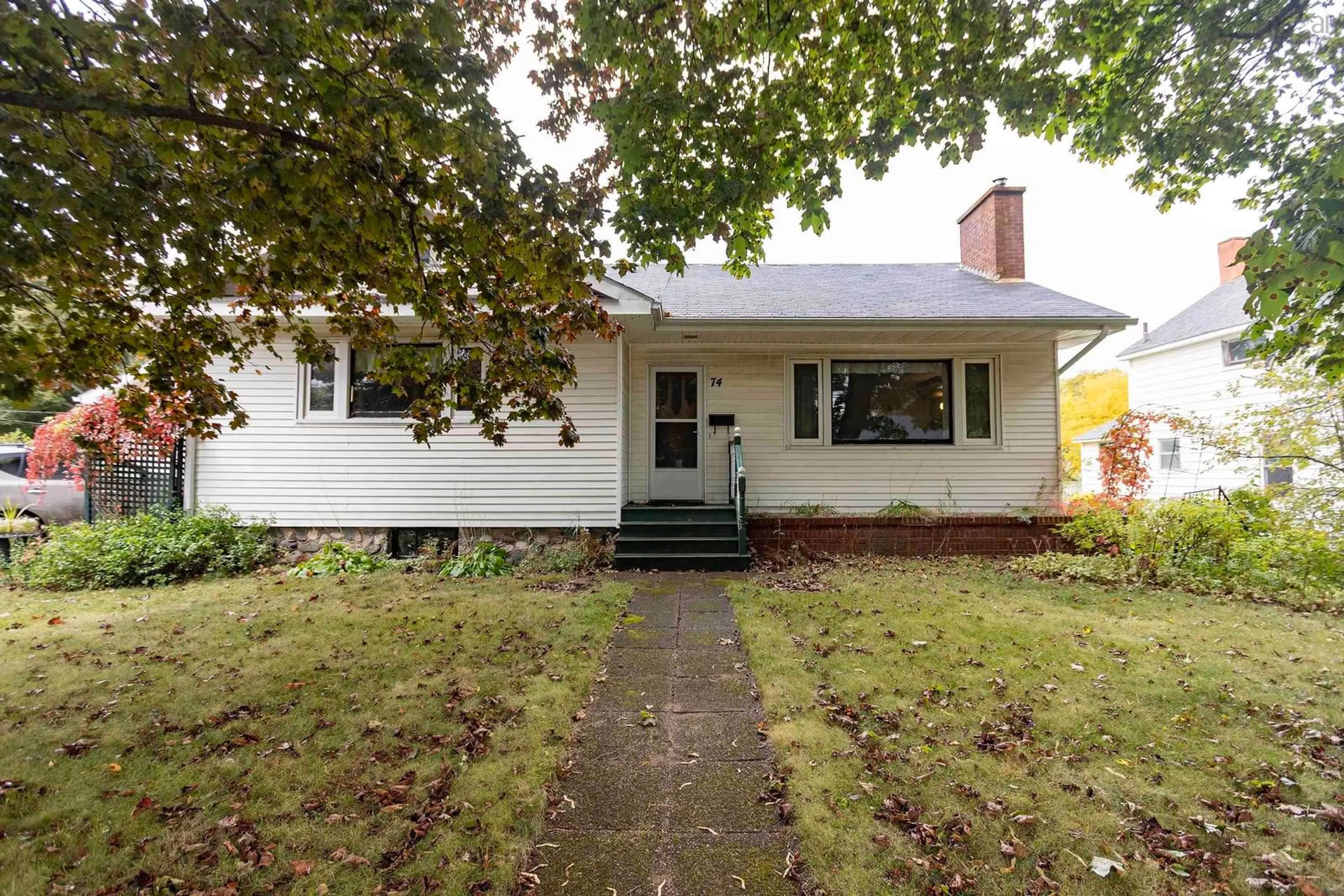 Home with vinyl exterior material, street for 74 Spring St, Amherst Nova Scotia B4H 1S7