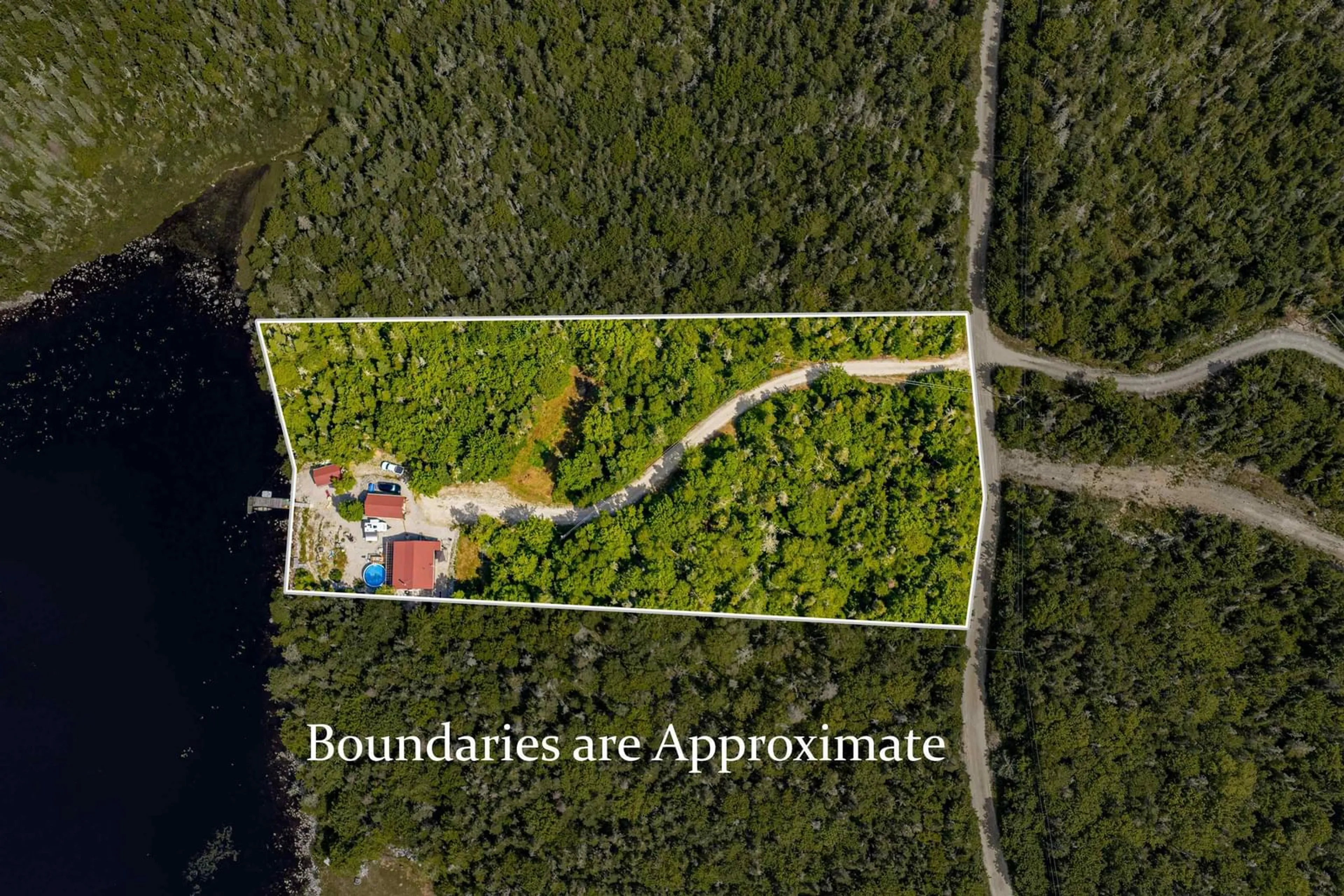 A pic from outside/outdoor area/front of a property/back of a property/a pic from drone, building for 1749 Mcleans Lake Rd, Port L'Hebert Nova Scotia B0T 1V0