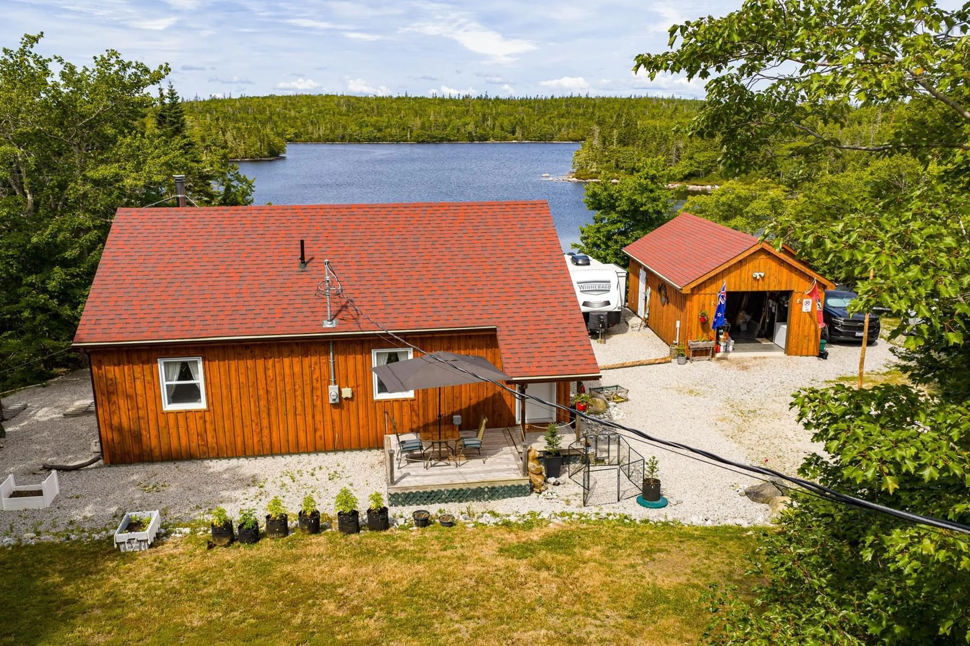 A pic from outside/outdoor area/front of a property/back of a property/a pic from drone, water/lake/river/ocean view for 1749 Mcleans Lake Rd, Port L'Hebert Nova Scotia B0T 1V0