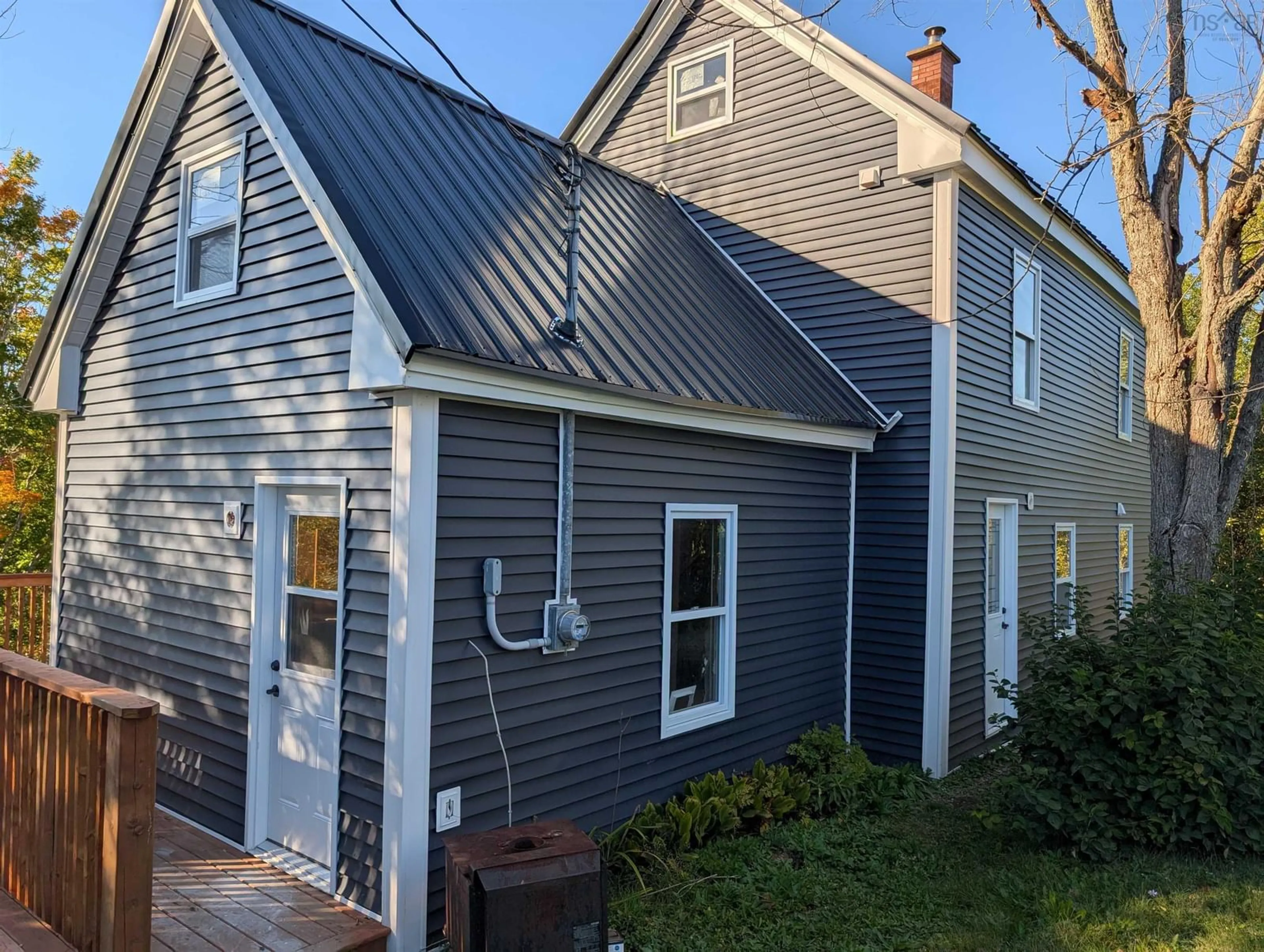 Home with vinyl exterior material, street for 63 Station Rd, Great Village Nova Scotia B0M 1L0