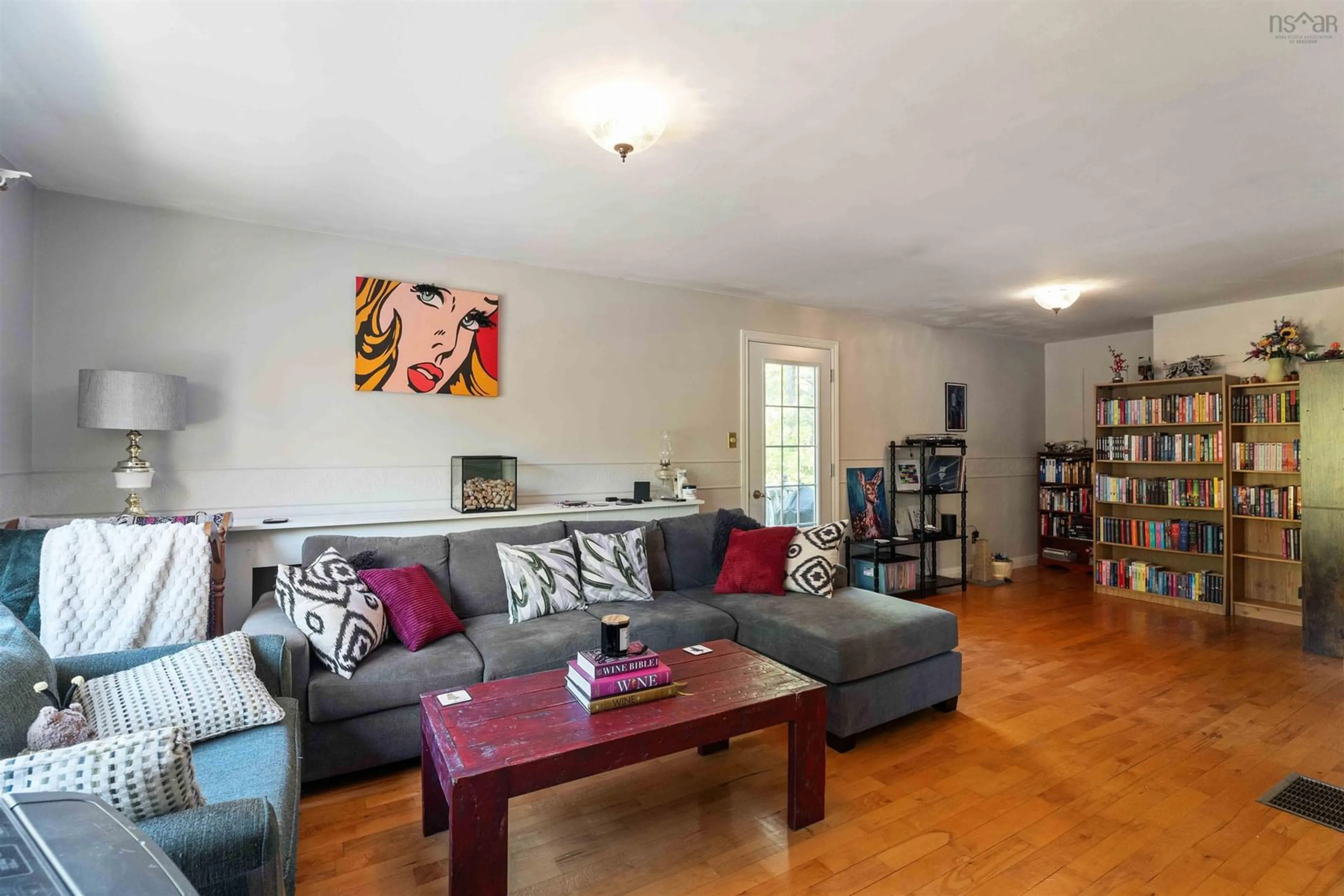 Living room with furniture, wood/laminate floor for 71 Dow Rd, New Minas Nova Scotia B4N 3R4