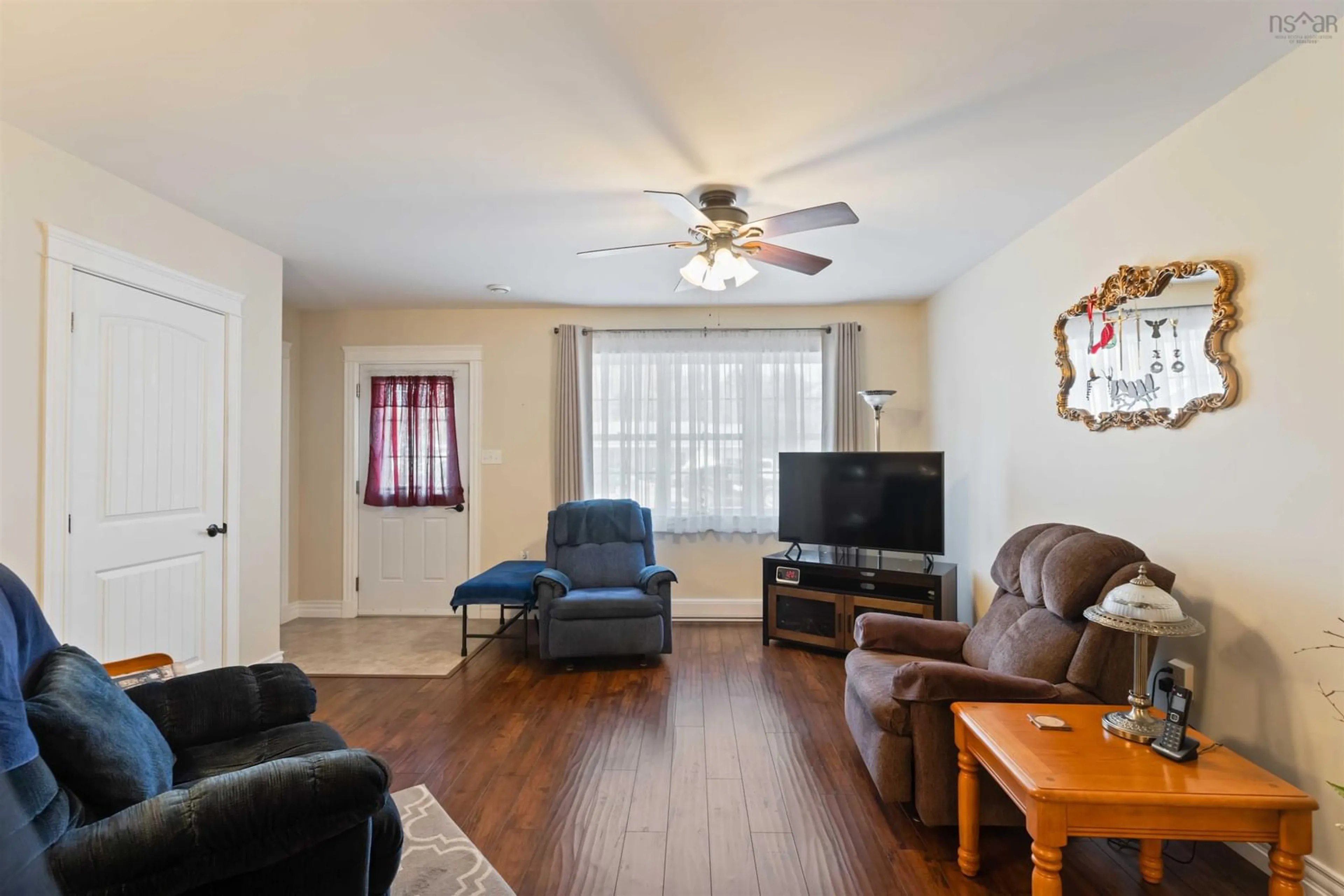 Living room with furniture, wood/laminate floor for 117 & 119 Fairview Dr, Nictaux Nova Scotia B0S 1P0