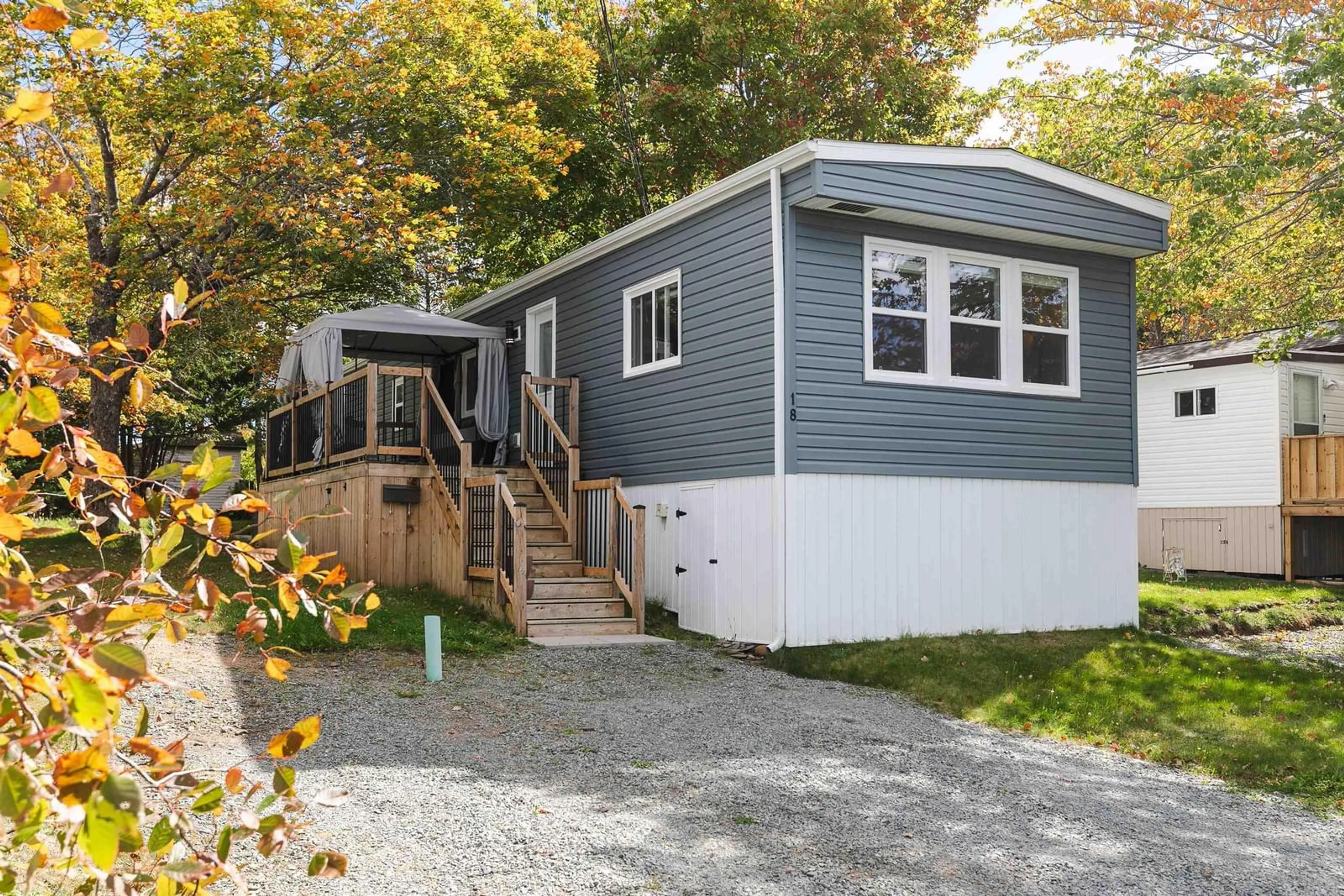 Home with vinyl exterior material, street for 18 Commodore Ave, Middle Sackville Nova Scotia B4E 3B2