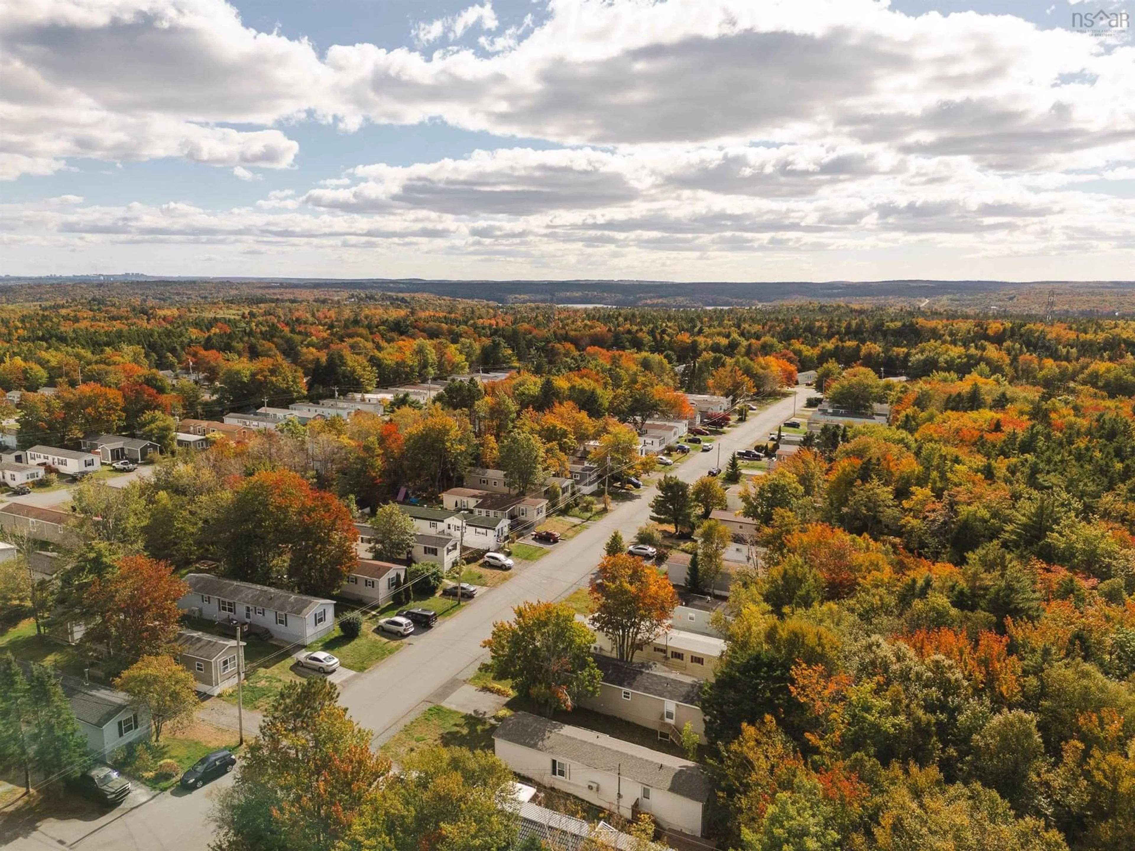 A pic from outside/outdoor area/front of a property/back of a property/a pic from drone, street for 18 Commodore Ave, Middle Sackville Nova Scotia B4E 3B2