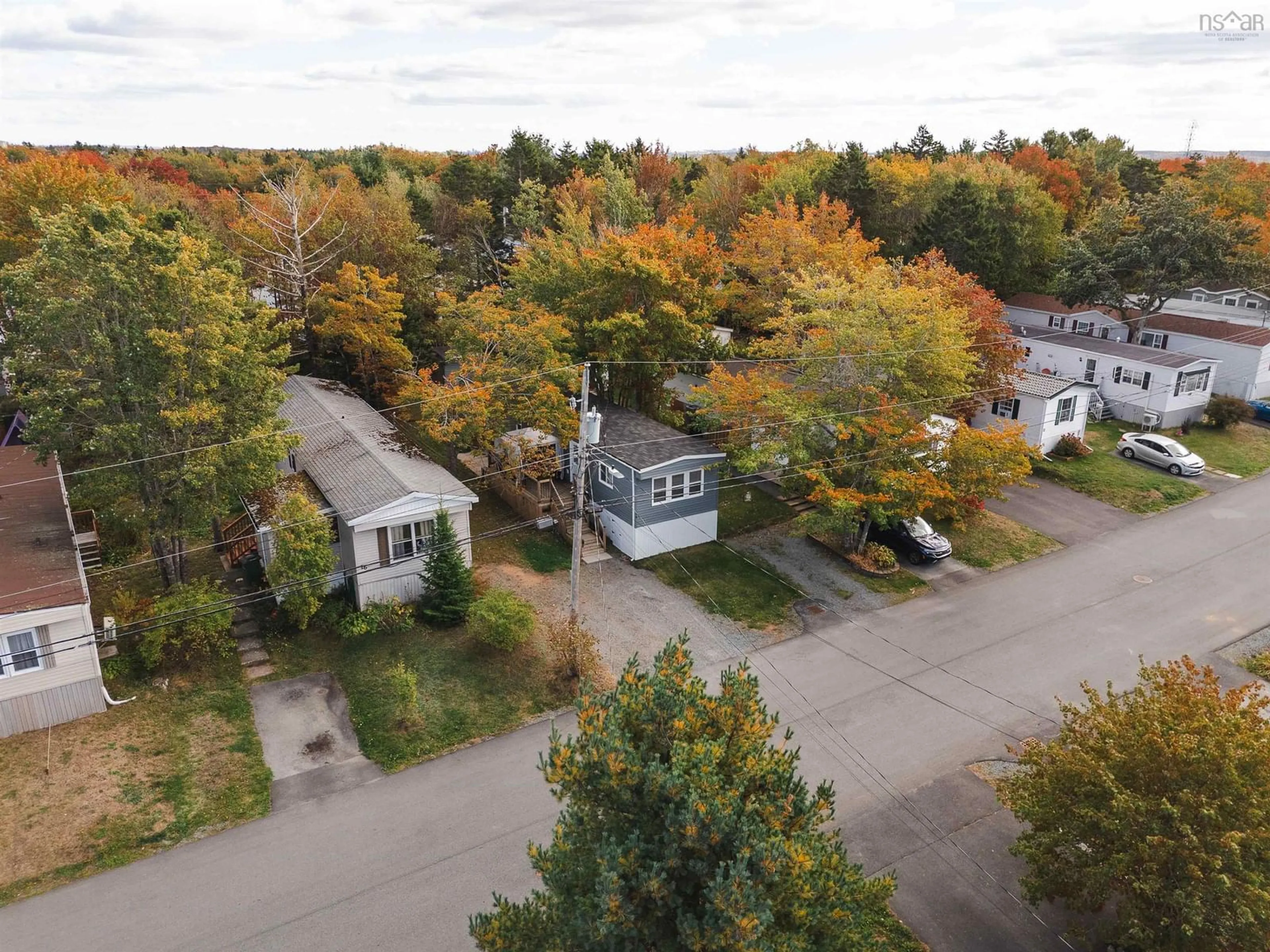 A pic from outside/outdoor area/front of a property/back of a property/a pic from drone, street for 18 Commodore Ave, Middle Sackville Nova Scotia B4E 3B2