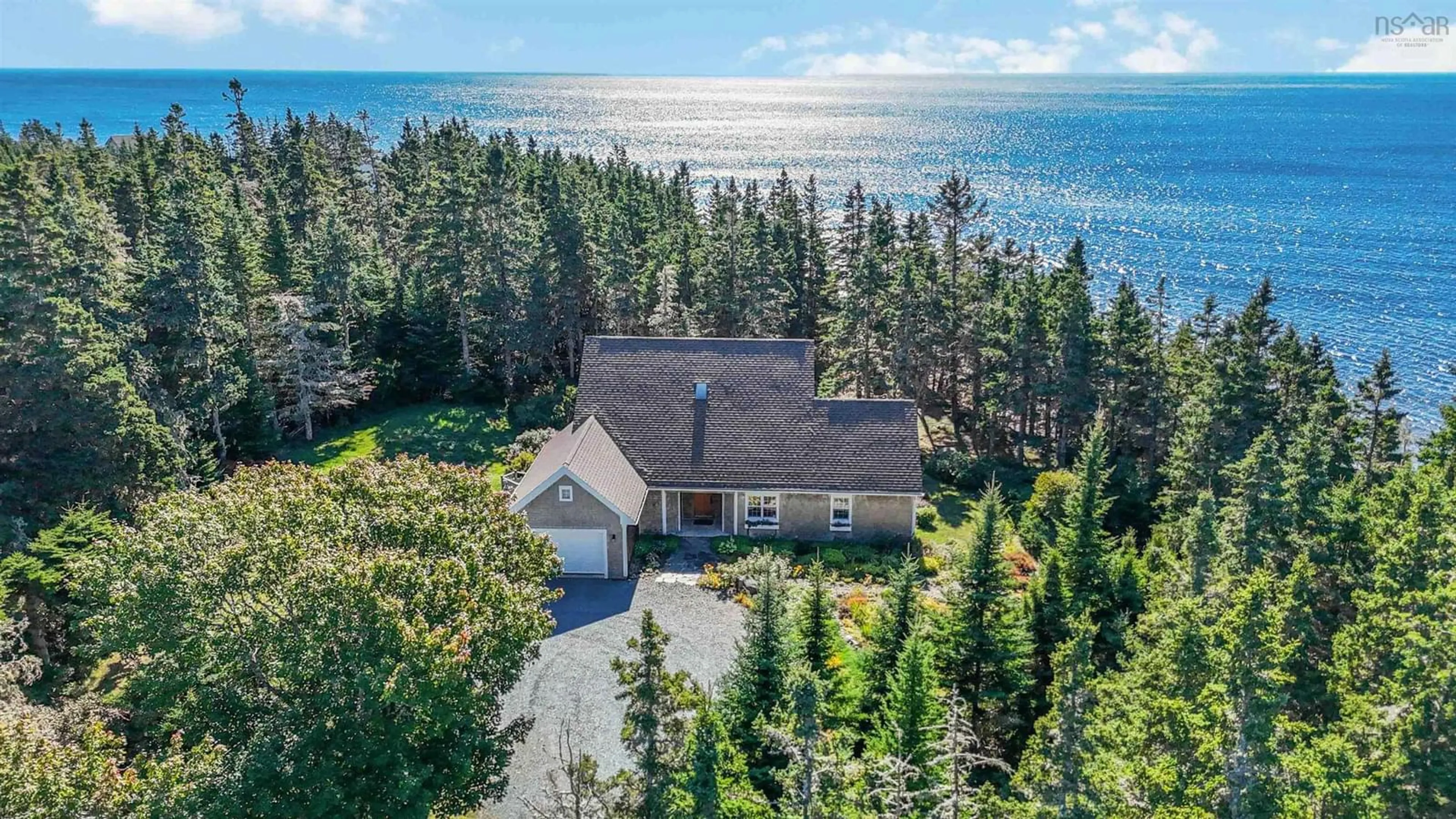 A pic from outside/outdoor area/front of a property/back of a property/a pic from drone, water/lake/river/ocean view for 42 Pierce Point Rd, Western Head Nova Scotia B0T 1K0