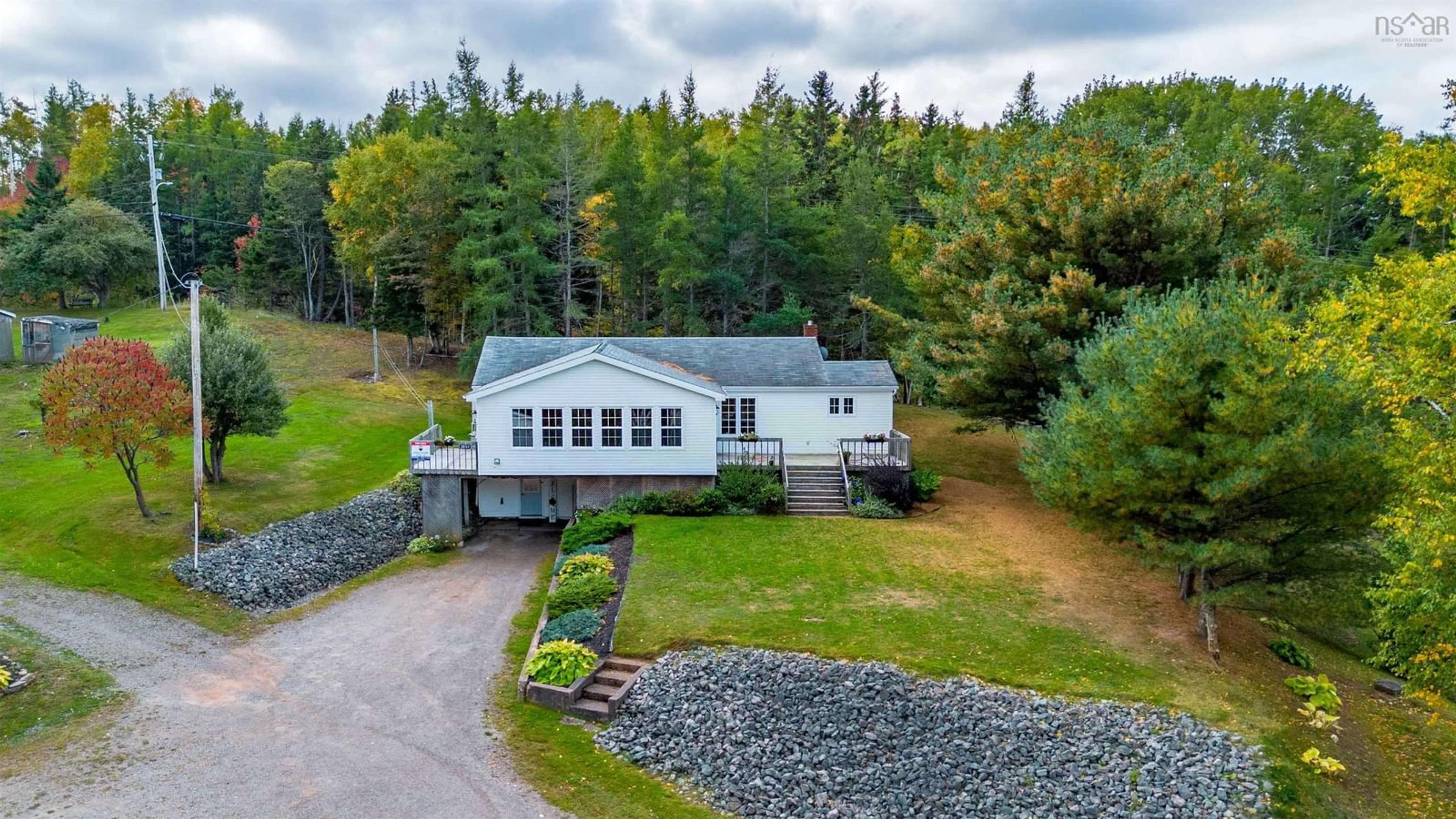 A pic from outside/outdoor area/front of a property/back of a property/a pic from drone, water/lake/river/ocean view for 2691 East Margaree Rd, Margaree Forks Nova Scotia B0E 2A0