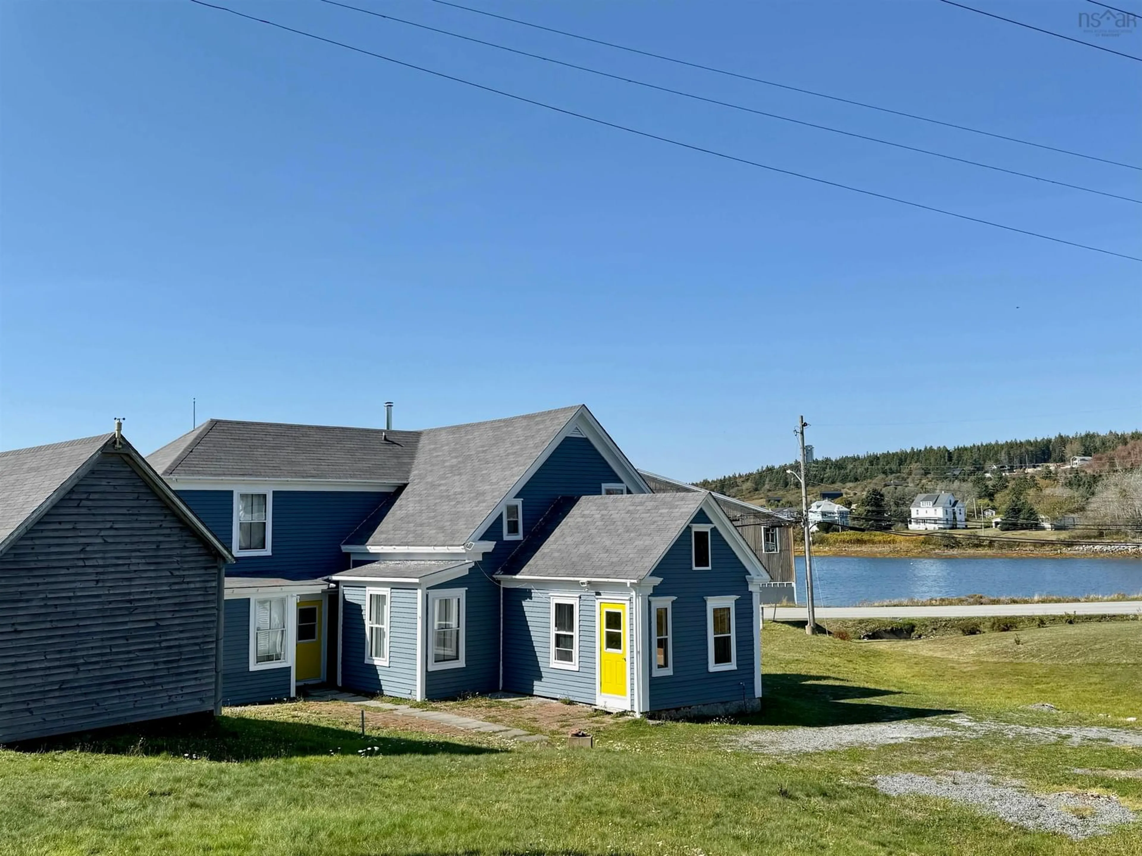 A pic from outside/outdoor area/front of a property/back of a property/a pic from drone, water/lake/river/ocean view for 19 Lower Lahave Rd, Riverport Nova Scotia B0J 2W0