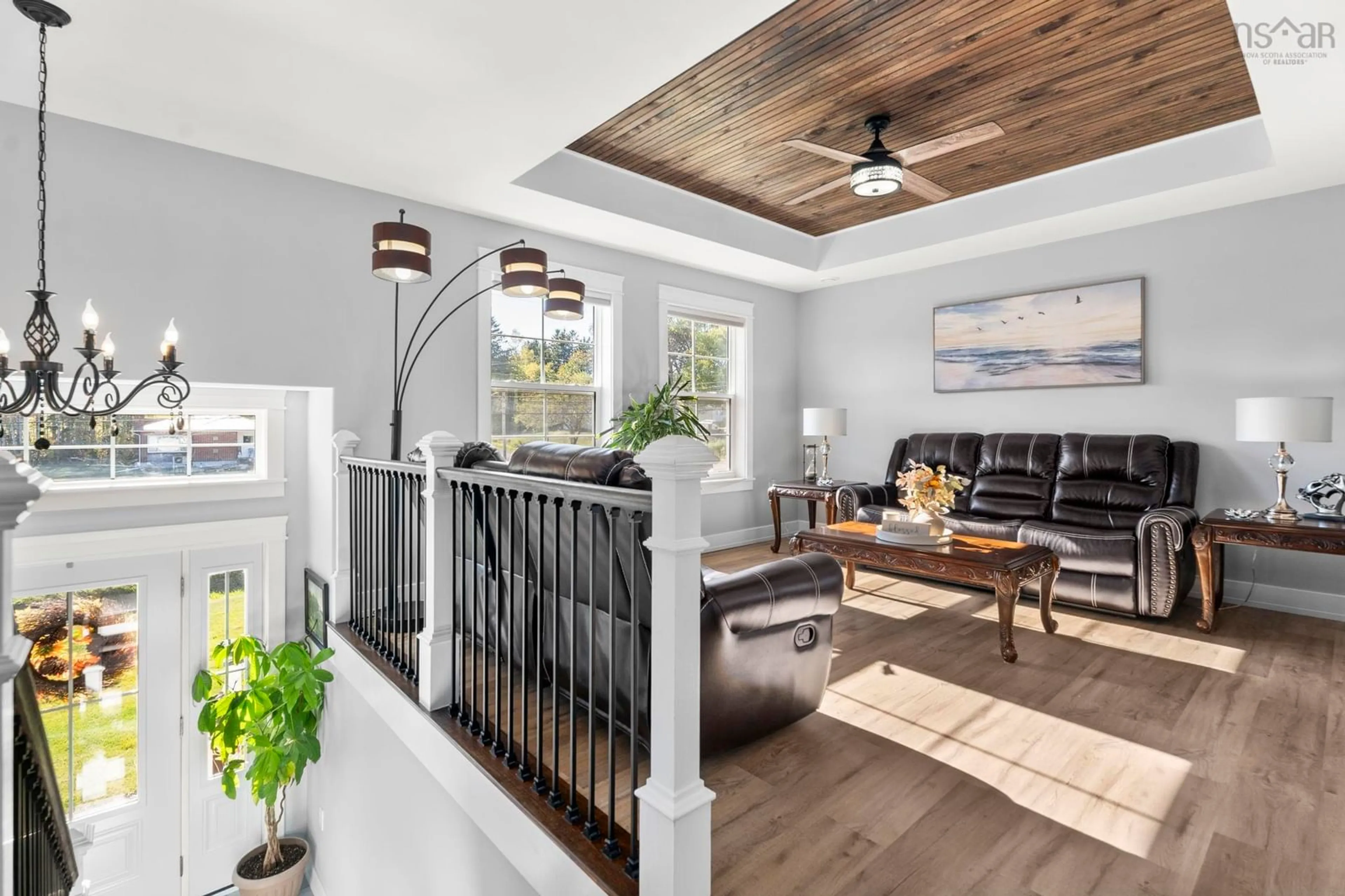 Living room with furniture, wood/laminate floor for 13691 Highway 1, Hants Border Nova Scotia B0P 1P0