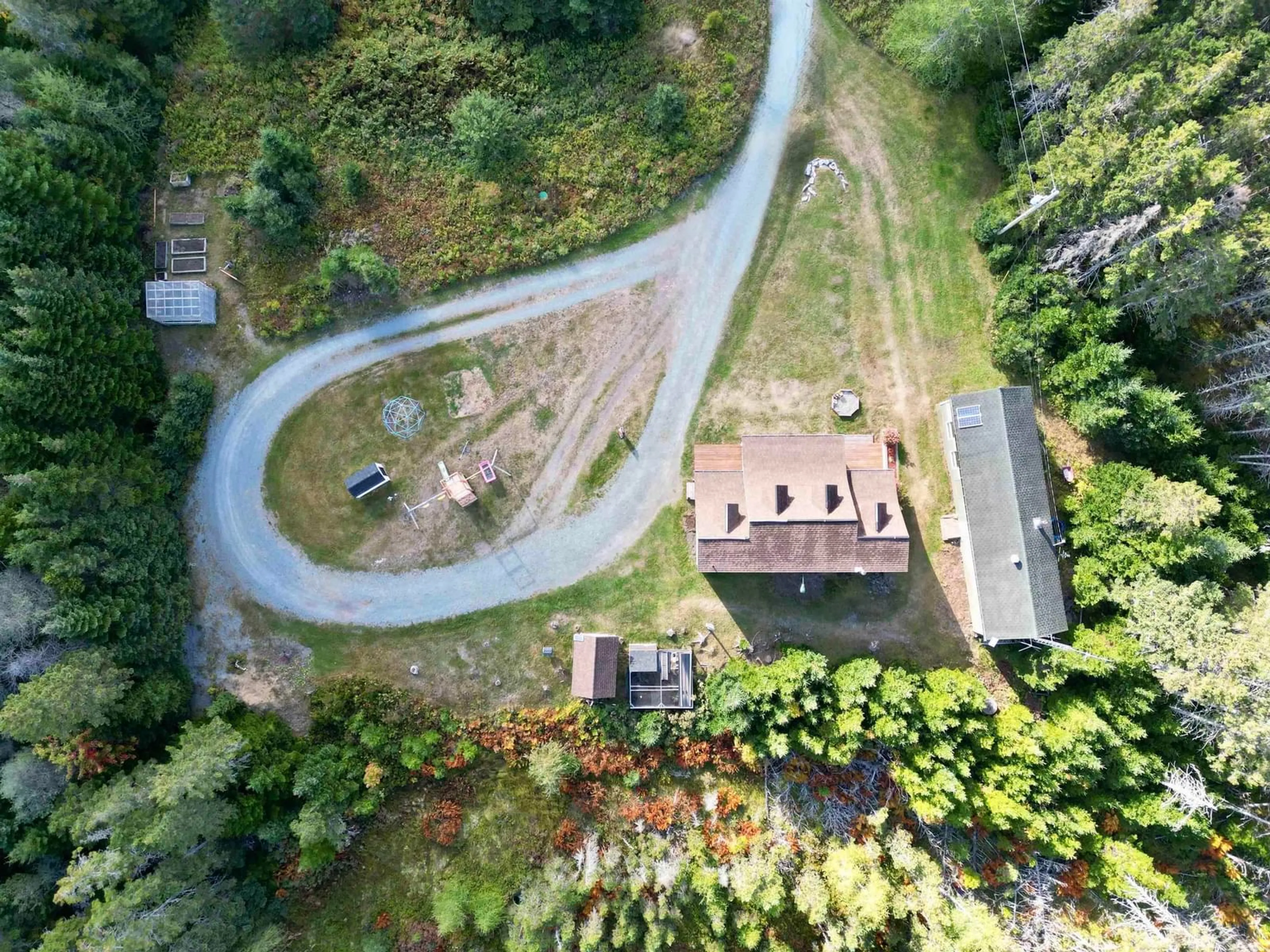A pic from outside/outdoor area/front of a property/back of a property/a pic from drone, street for 8633 Highway 4, River Bourgeois Nova Scotia B0E 2X0