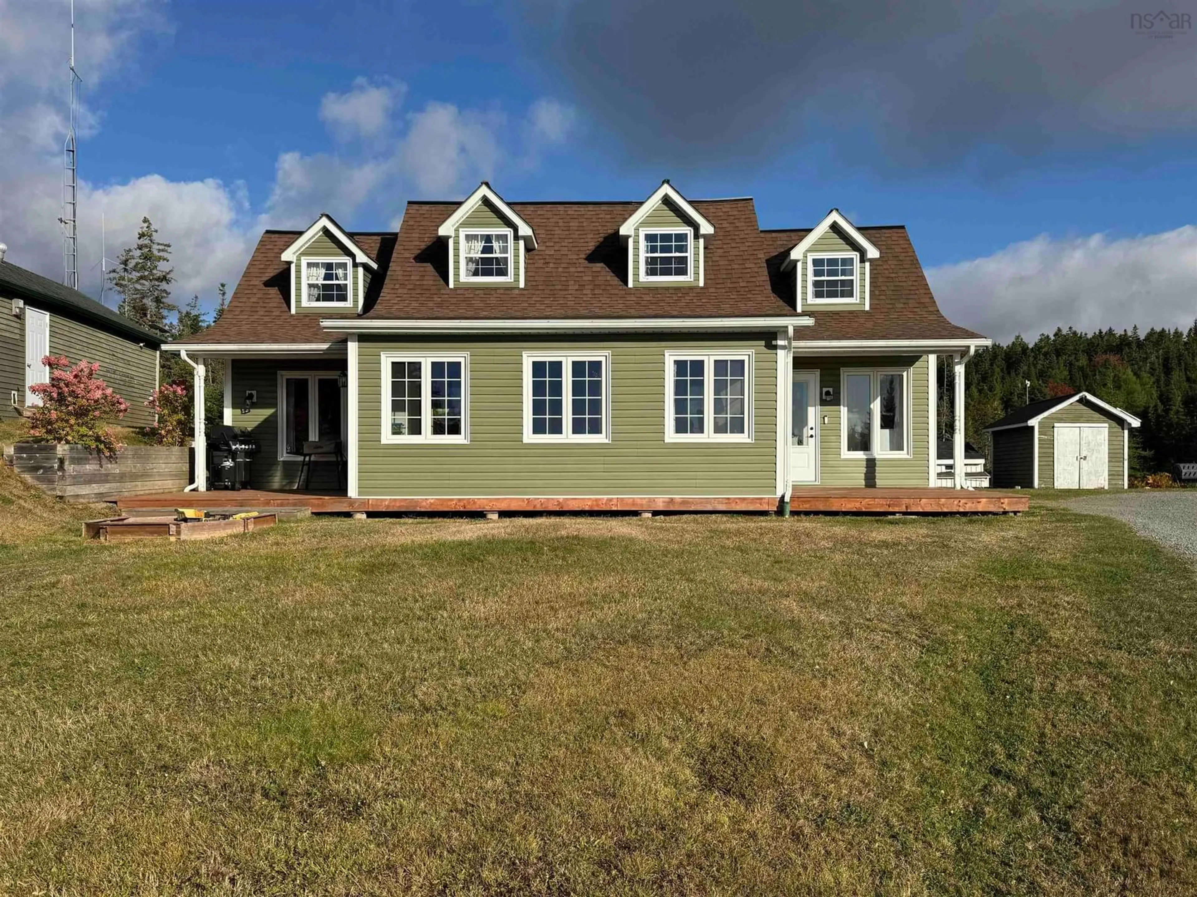 Home with vinyl exterior material, building for 8633 Highway 4, River Bourgeois Nova Scotia B0E 2X0