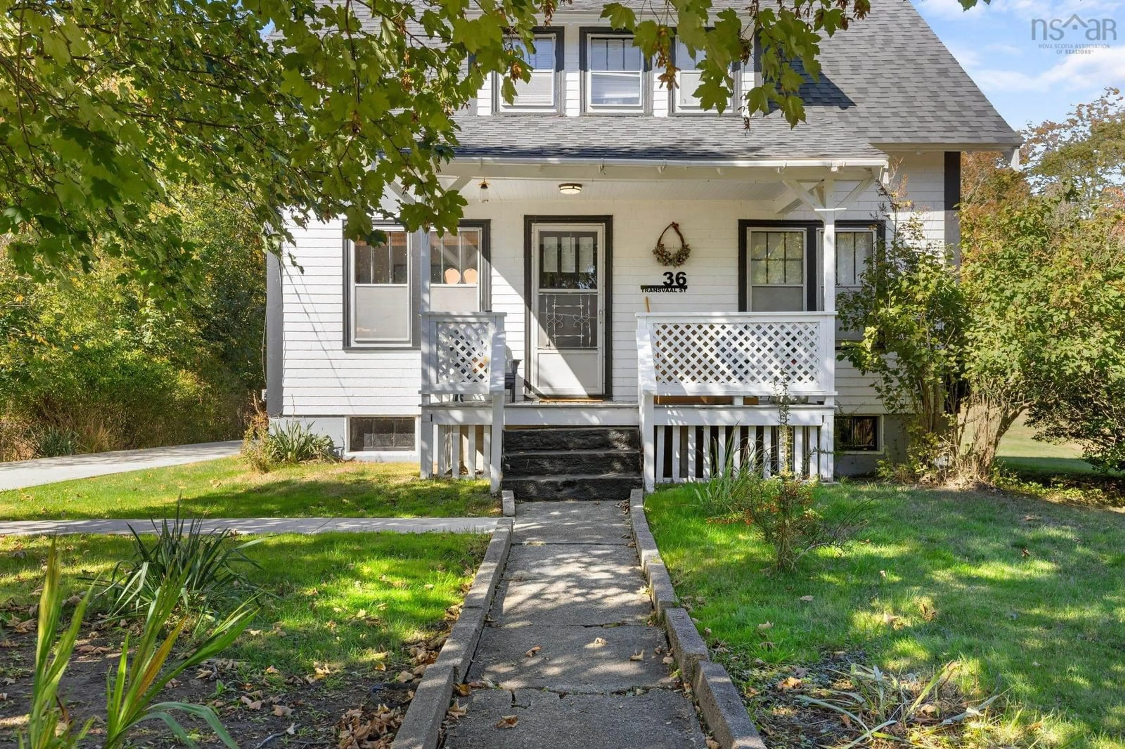 Home with vinyl exterior material, street for 36 Transvaal St, Shelburne Nova Scotia B0T 1W0