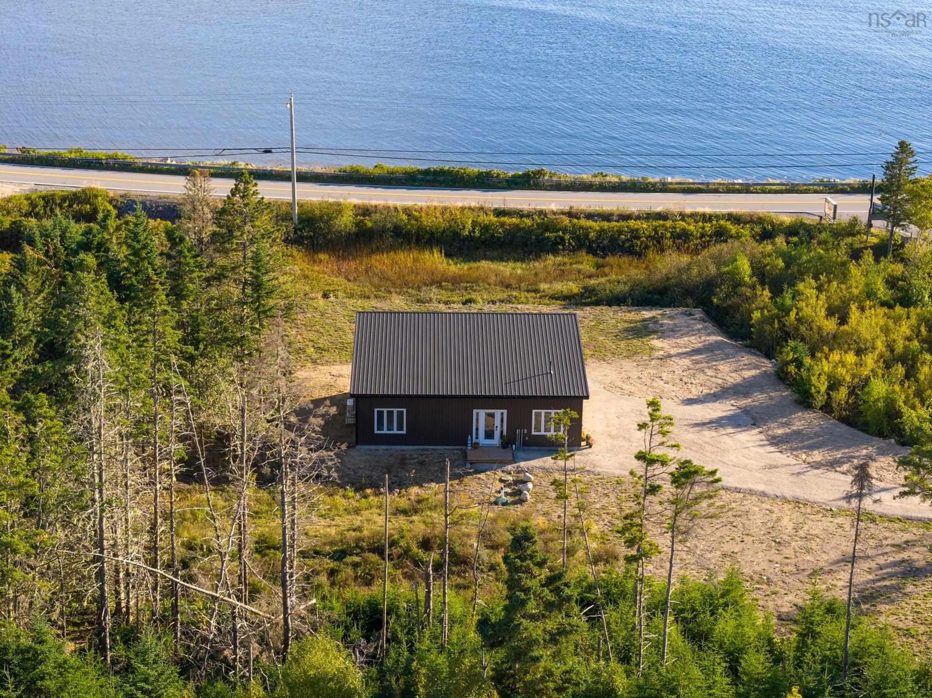 A pic from outside/outdoor area/front of a property/back of a property/a pic from drone, water/lake/river/ocean view for 12 Firehall Rd, Blandford Nova Scotia B0J 1T0
