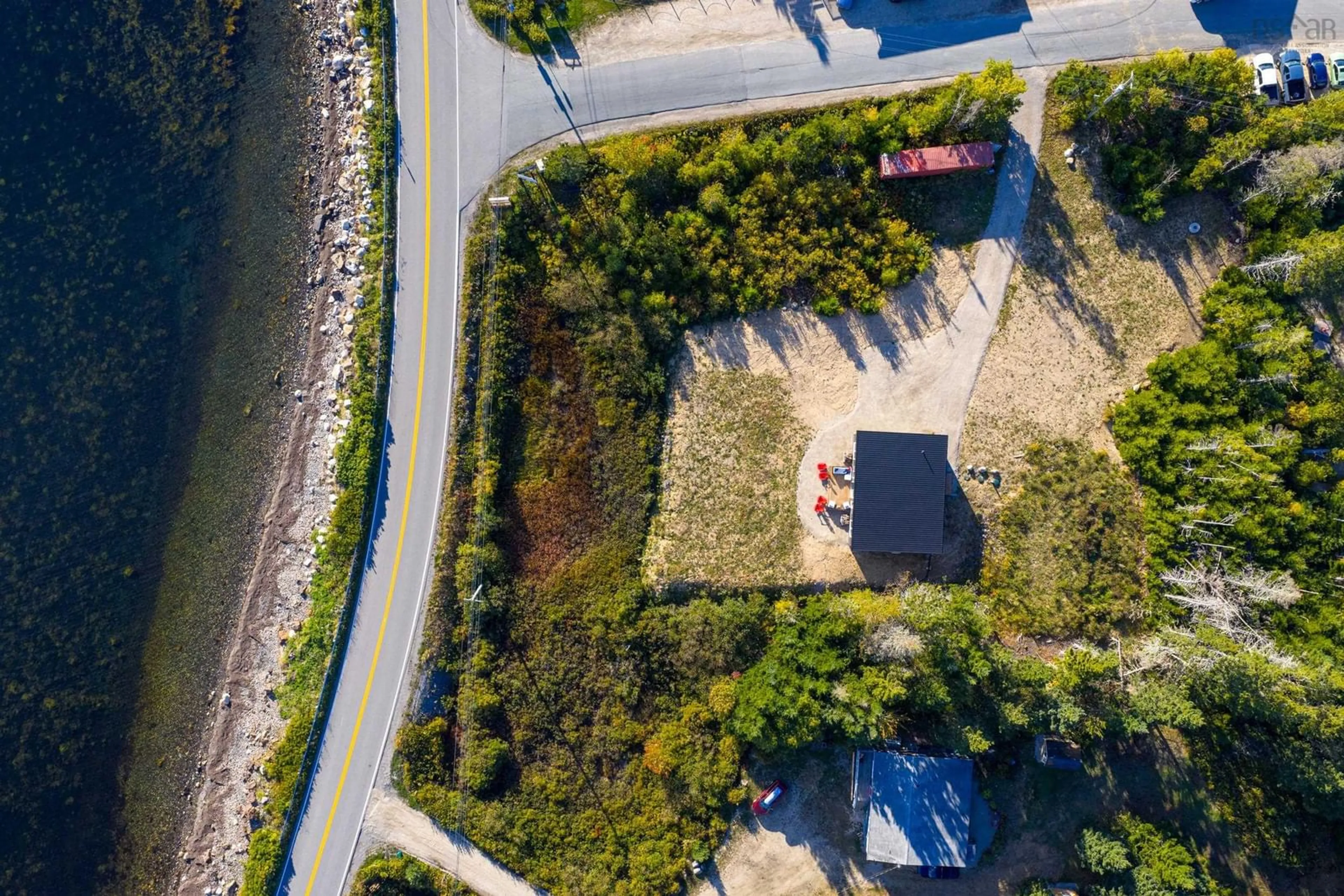 A pic from outside/outdoor area/front of a property/back of a property/a pic from drone, street for 12 Firehall Rd, Blandford Nova Scotia B0J 1T0