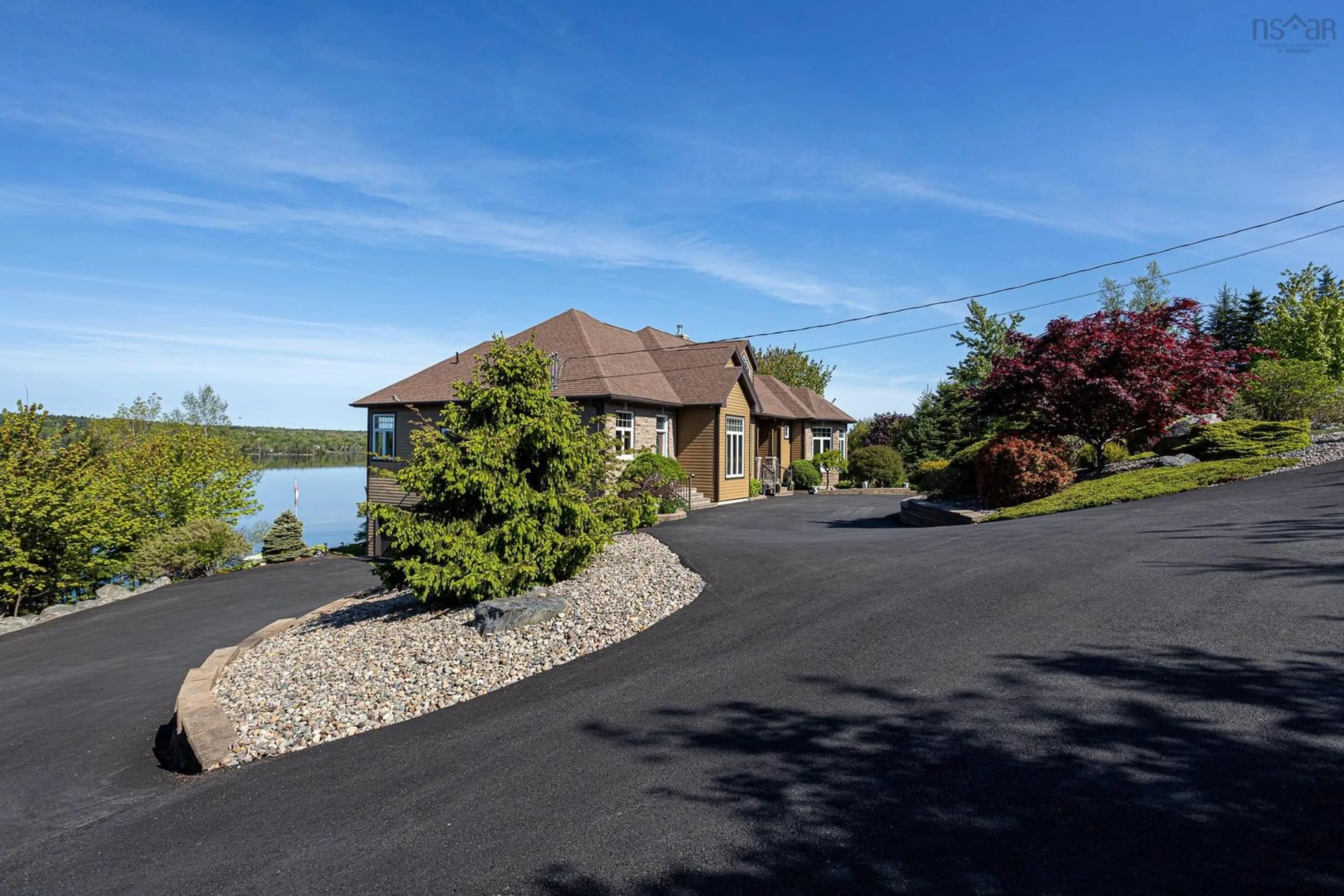 A pic from outside/outdoor area/front of a property/back of a property/a pic from drone, water/lake/river/ocean view for 16 Joan Elizabeth Way, Porters Lake Nova Scotia B3E 1N9
