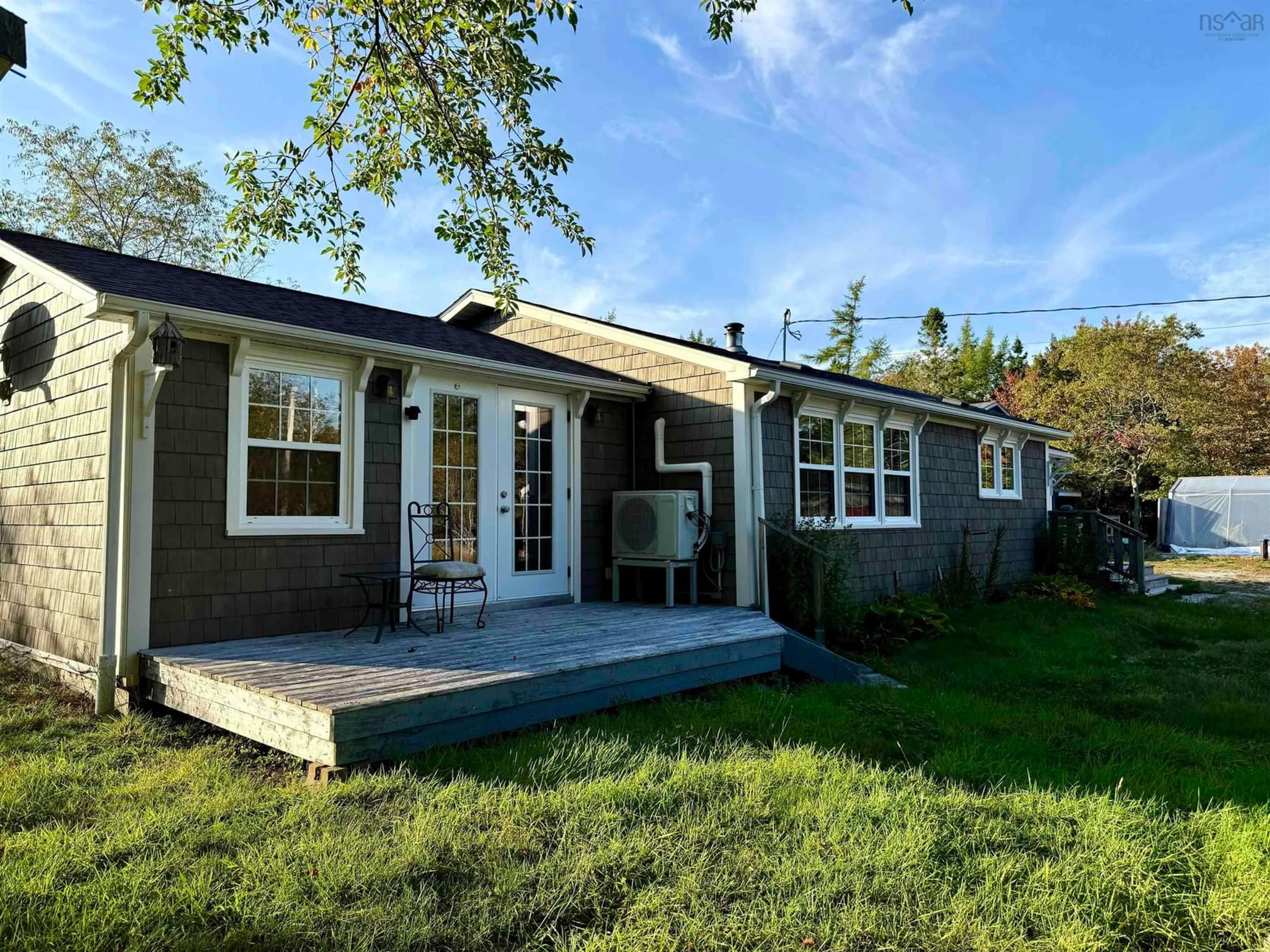 Home with vinyl exterior material, street for 4167 Sandy Point Rd, Jordan Bay Nova Scotia B0T 1W0