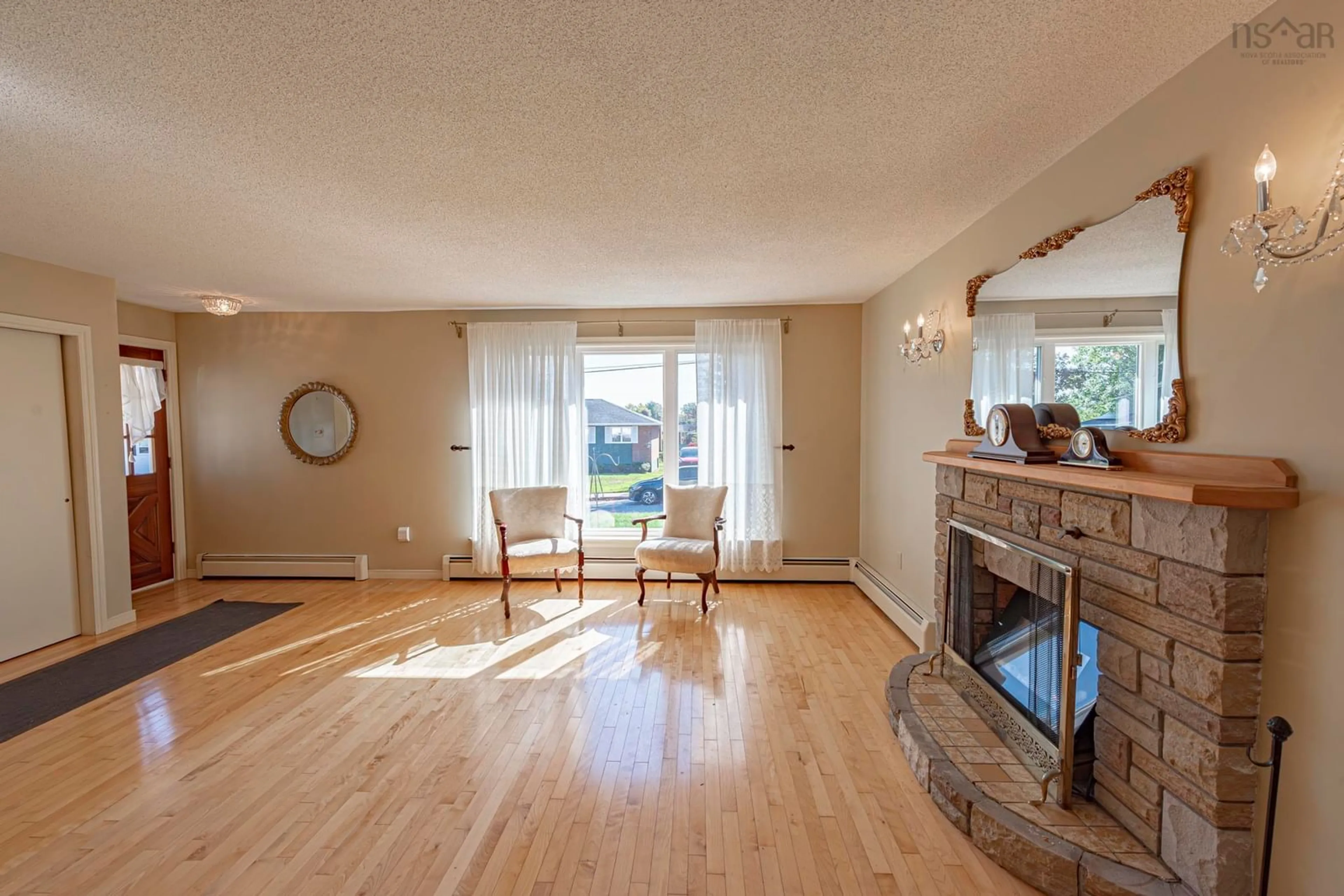 Living room with furniture, wood/laminate floor for 389 Dunbar Ave, New Glasgow Nova Scotia B2H 1W2