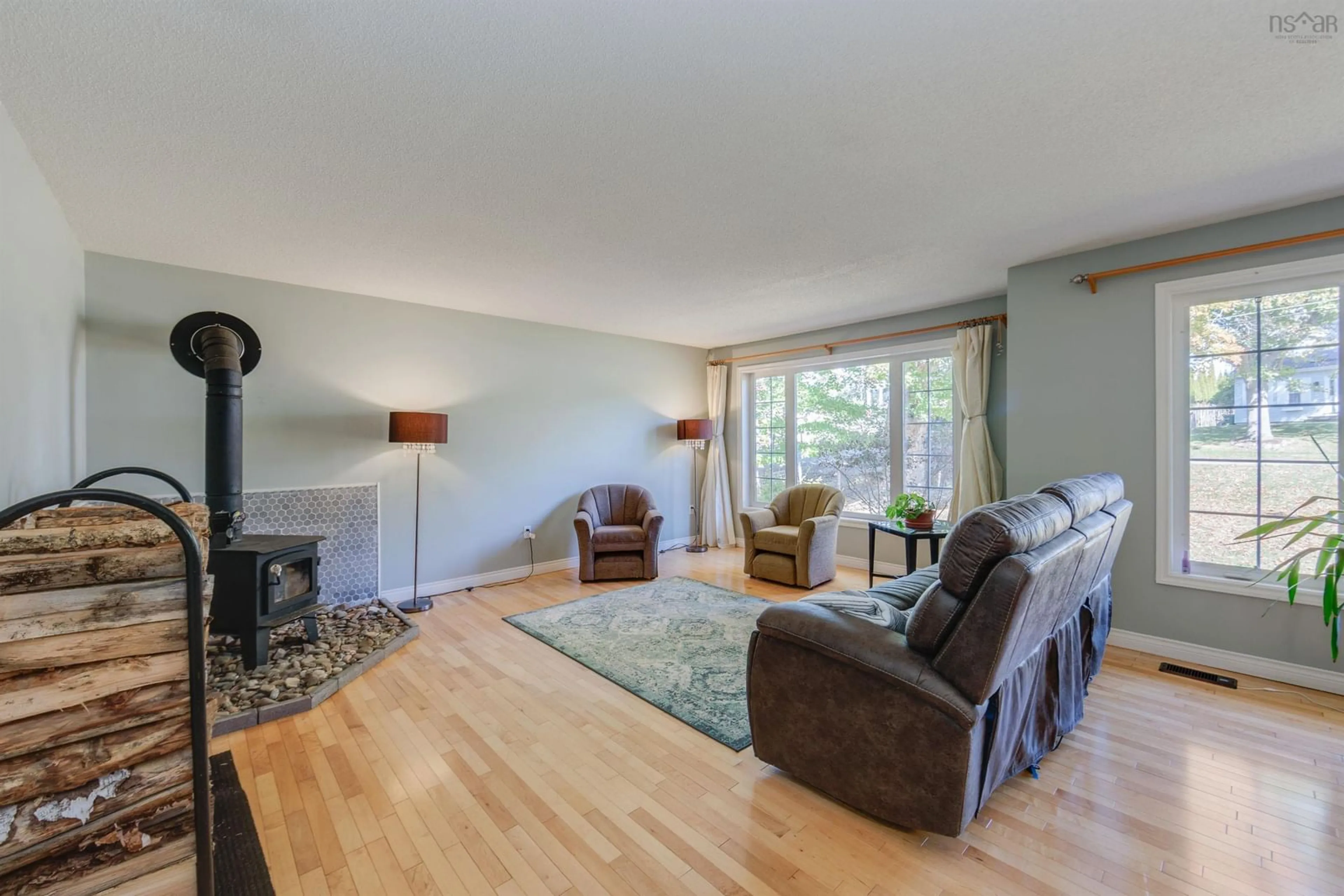 Living room with furniture, wood/laminate floor for 102 Maple Blvd, Bible Hill Nova Scotia B2N 4N3