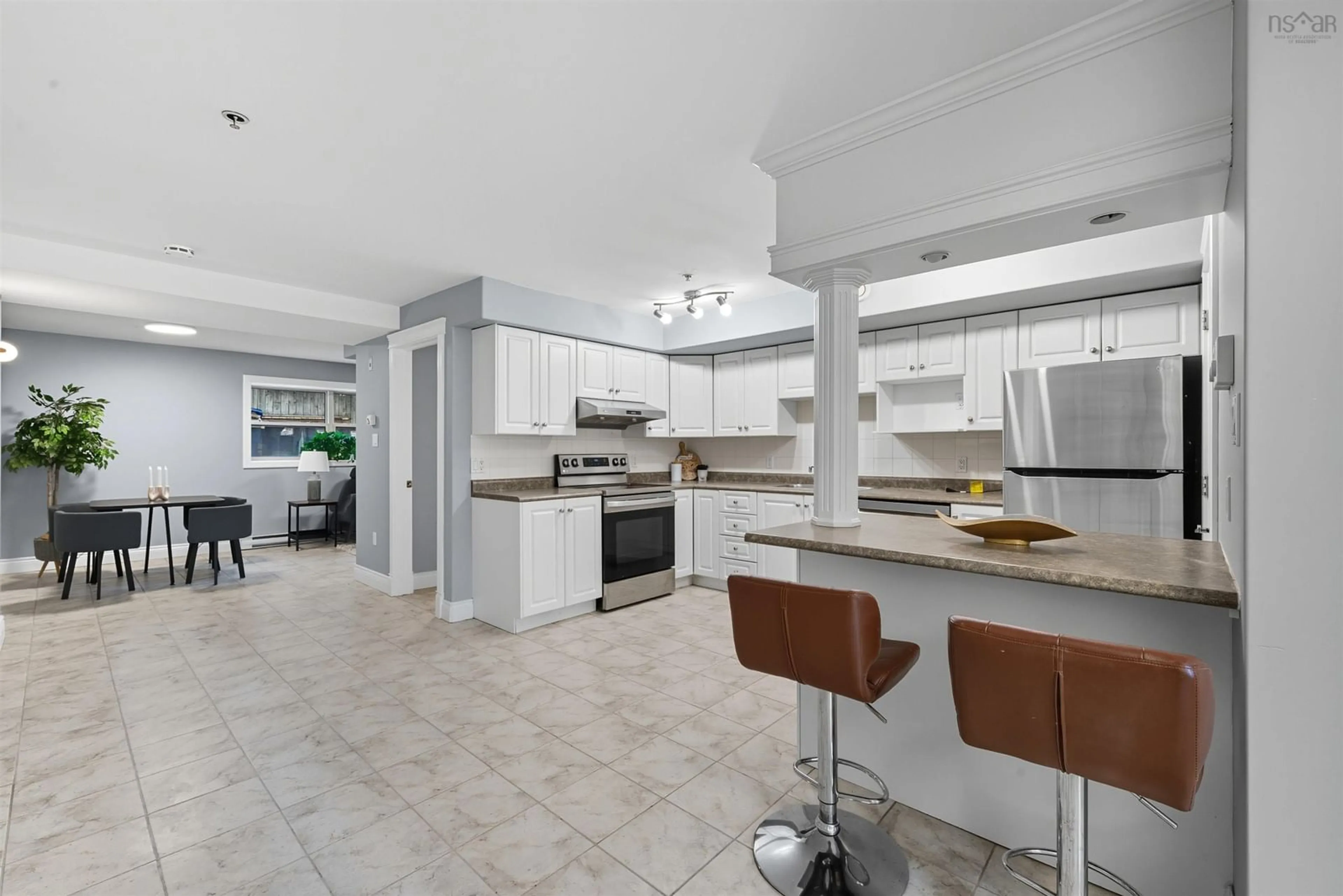Open concept kitchen, ceramic/tile floor for 5505 Inglis St #104, Halifax Nova Scotia B3H 1J9