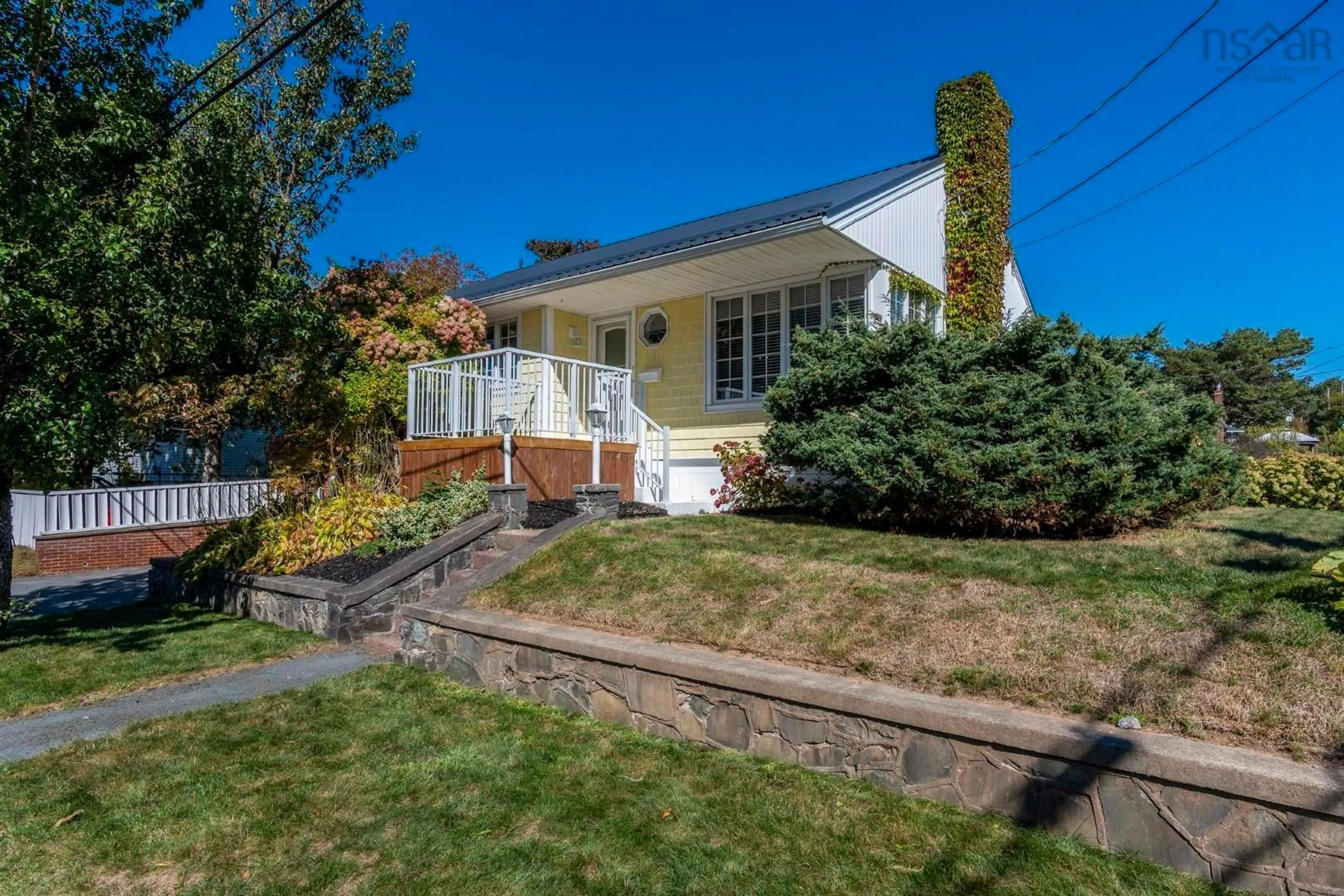 Home with vinyl exterior material, street for 2 Ryland Ave, Dartmouth Nova Scotia B3A 2G5