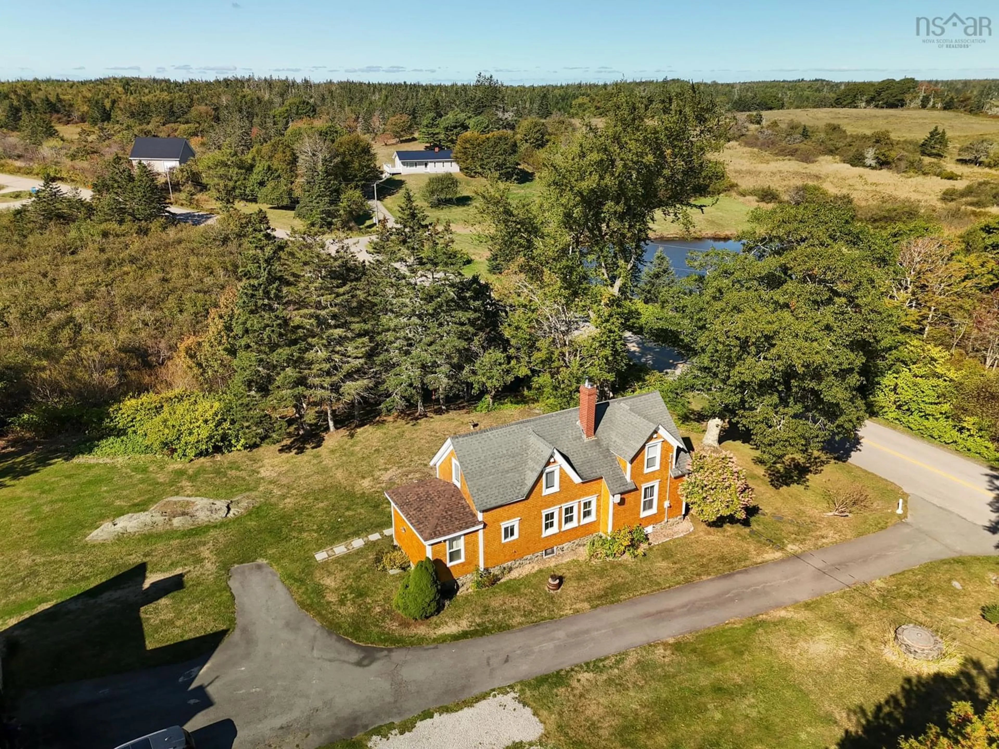 A pic from outside/outdoor area/front of a property/back of a property/a pic from drone, street for 47 Lakeside Rd, Hebron Nova Scotia B5A 5K4